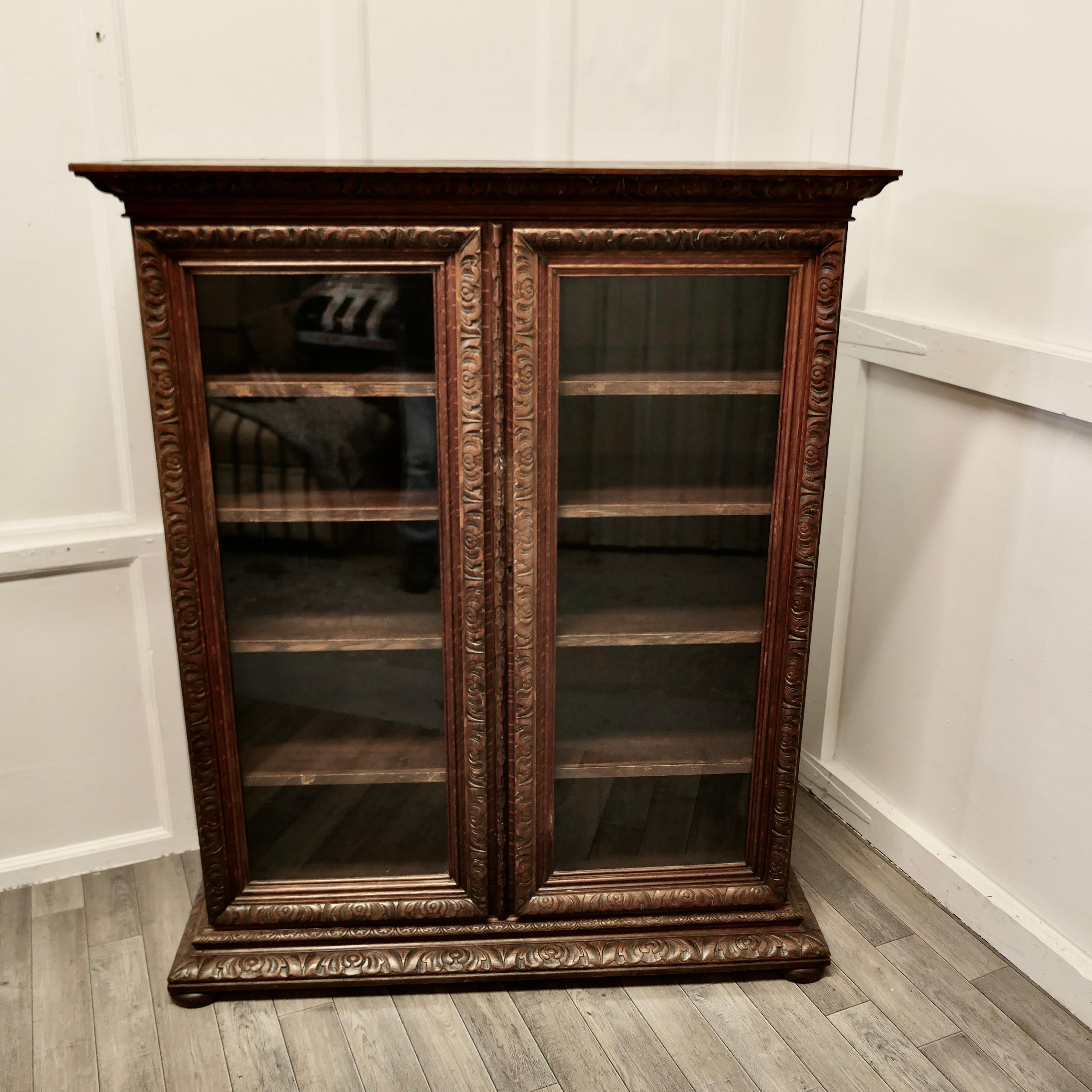 Gothic Fine Quality 19th Century Carved Oak Glazed Bookcase For Sale