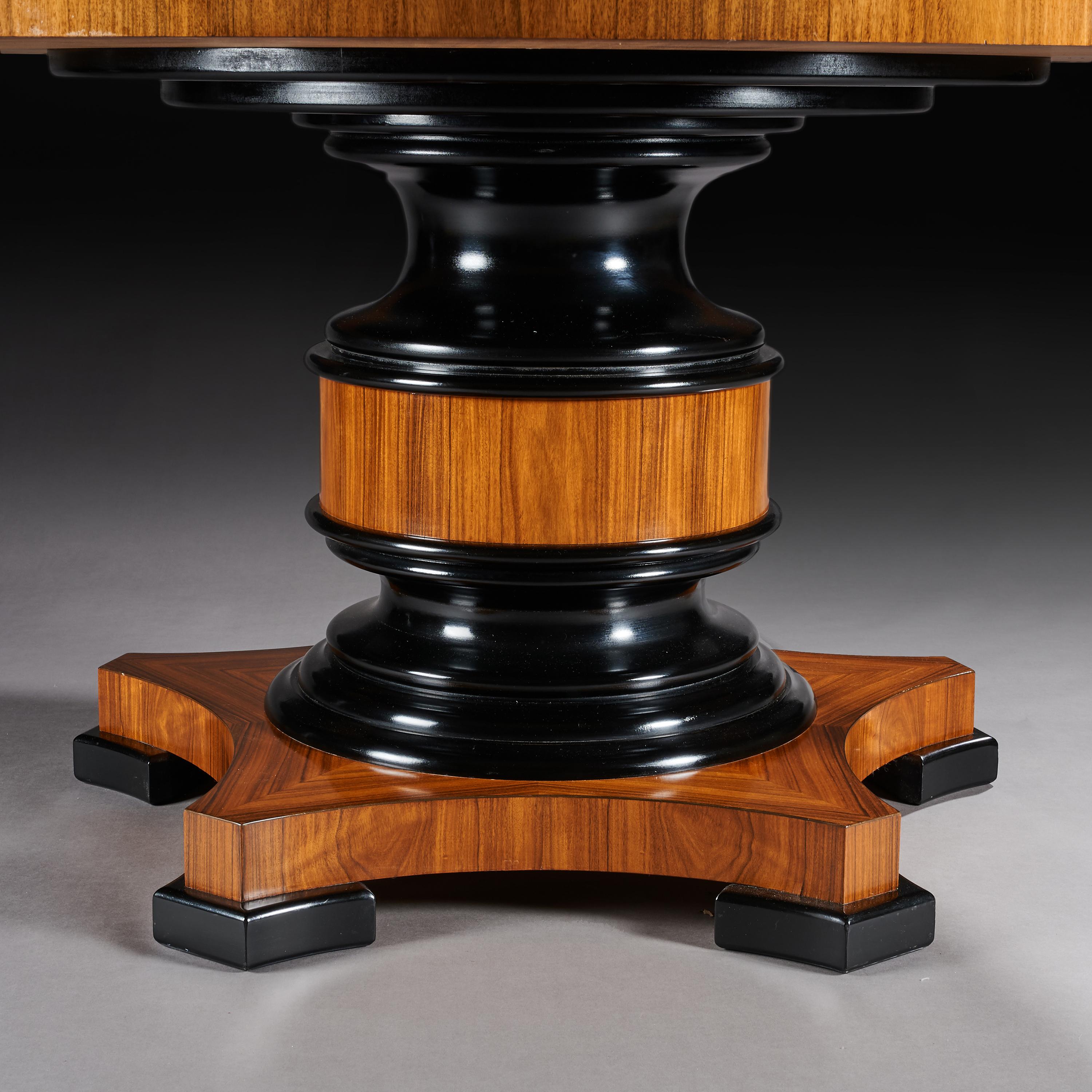 Fine Quality Circular Olive Wood and Ebony Dining Table 1