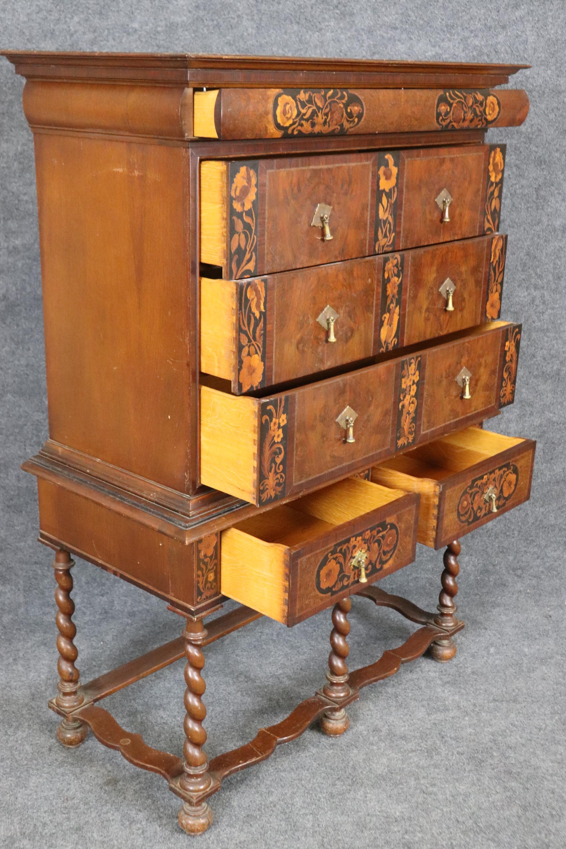 This is a fantastic cabinet made in Rockford, Illinois during the greatest time of American furniture companies that really made innovative and incredible replicas of some of the world's finiest antiques that were completely out of reach for most