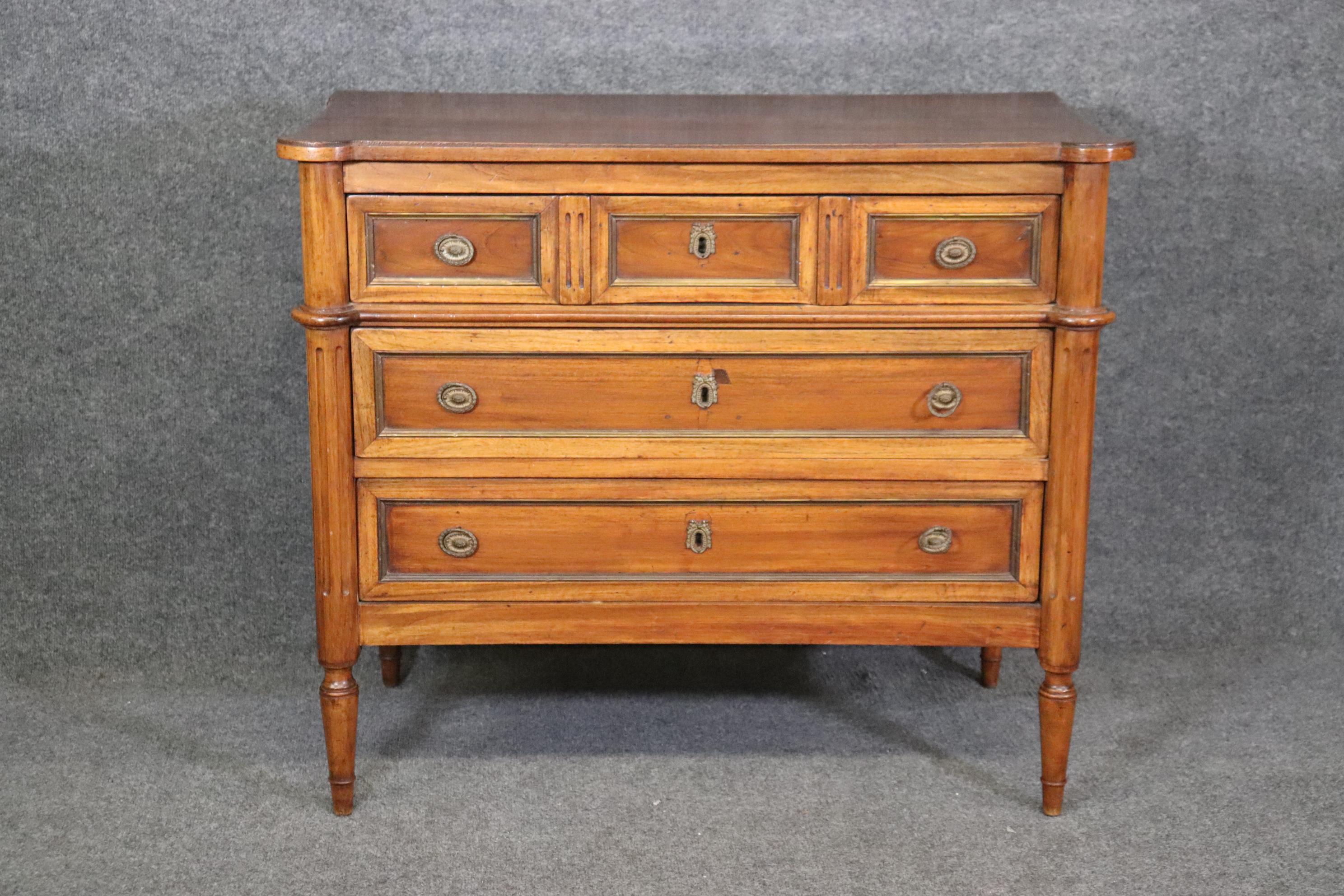 This commode dates to the 1880s era and is in good original antique condition, The commode has three drawers and measures 36.5 wide x 31.25 tall x 18.5 deep. 