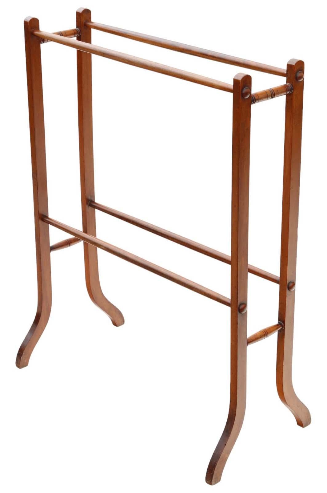 Introducing a Fine Quality Antique Arts and Crafts Victorian Towel Rail Stand from circa 1900.

Crafted with solid mixed wood construction, this piece boasts sturdy joints and no signs of woodworm, ensuring long-lasting durability.

Bound to make a