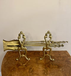Fine quality antique Edwardian brass fire irons and fire dogs