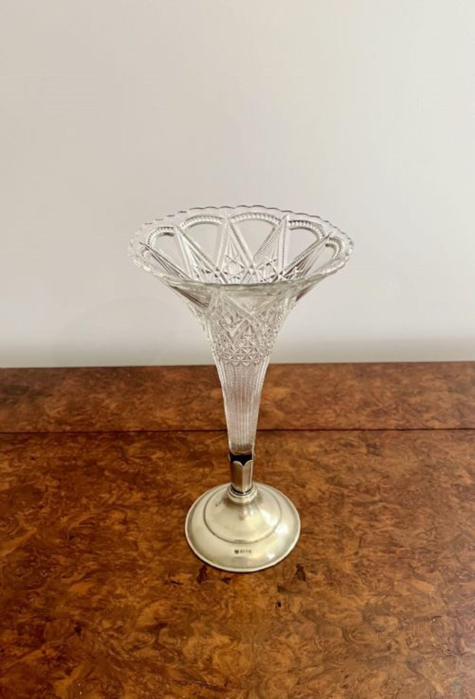 Fine quality antique Edwardian cut glass and silver plated fluted spill vase having a fine quality Edwardian spill vase with a cut glass body, fluted shape standing on a silver plated circular base. EPNS