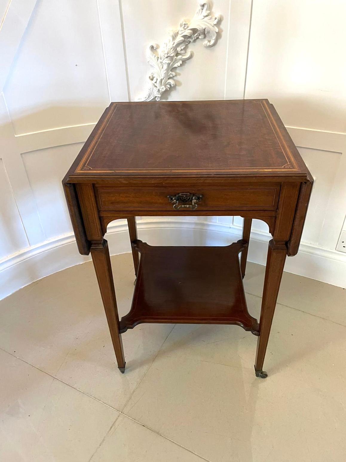 Fine quality antique Edwardian antique inlaid mahogany occasional / lamp table having a lovely mahogany top with two drop leaves and satinwood inlay, one frieze drawer with original handle, standing on four square elegant tapering legs with original