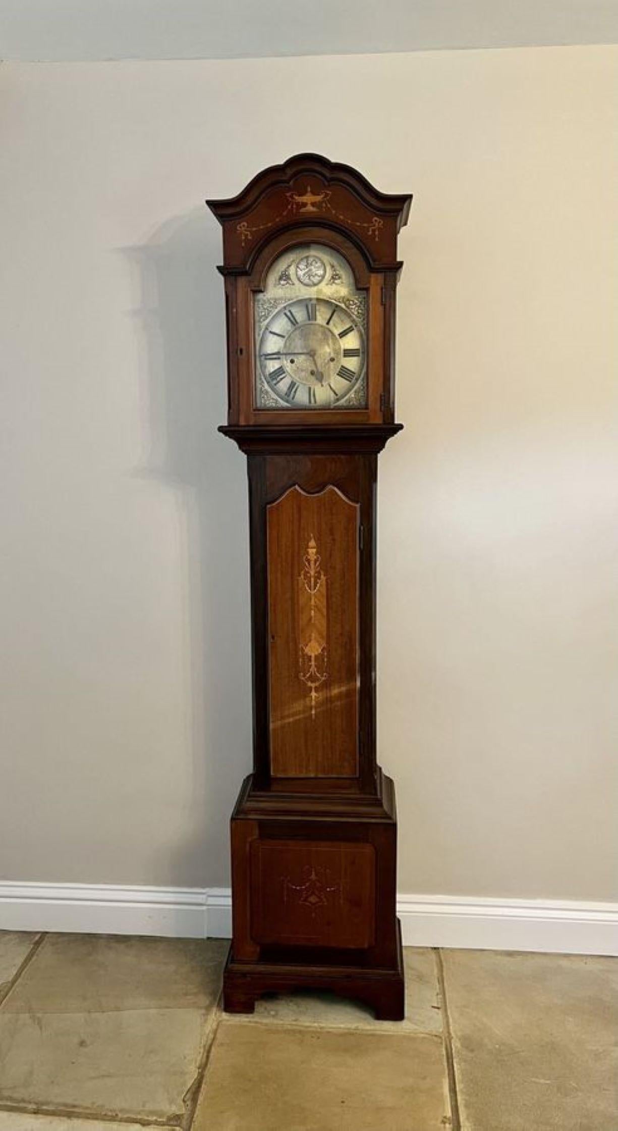 Fine quality antique Edwardian mahogany inlaid long case clock, having a quality mahogany inlaid case, a brass arch dial with Roman numerals, Tempus Fugit inscribed to the top, having a 8 day chiming movement chiming on the quarter, half and the