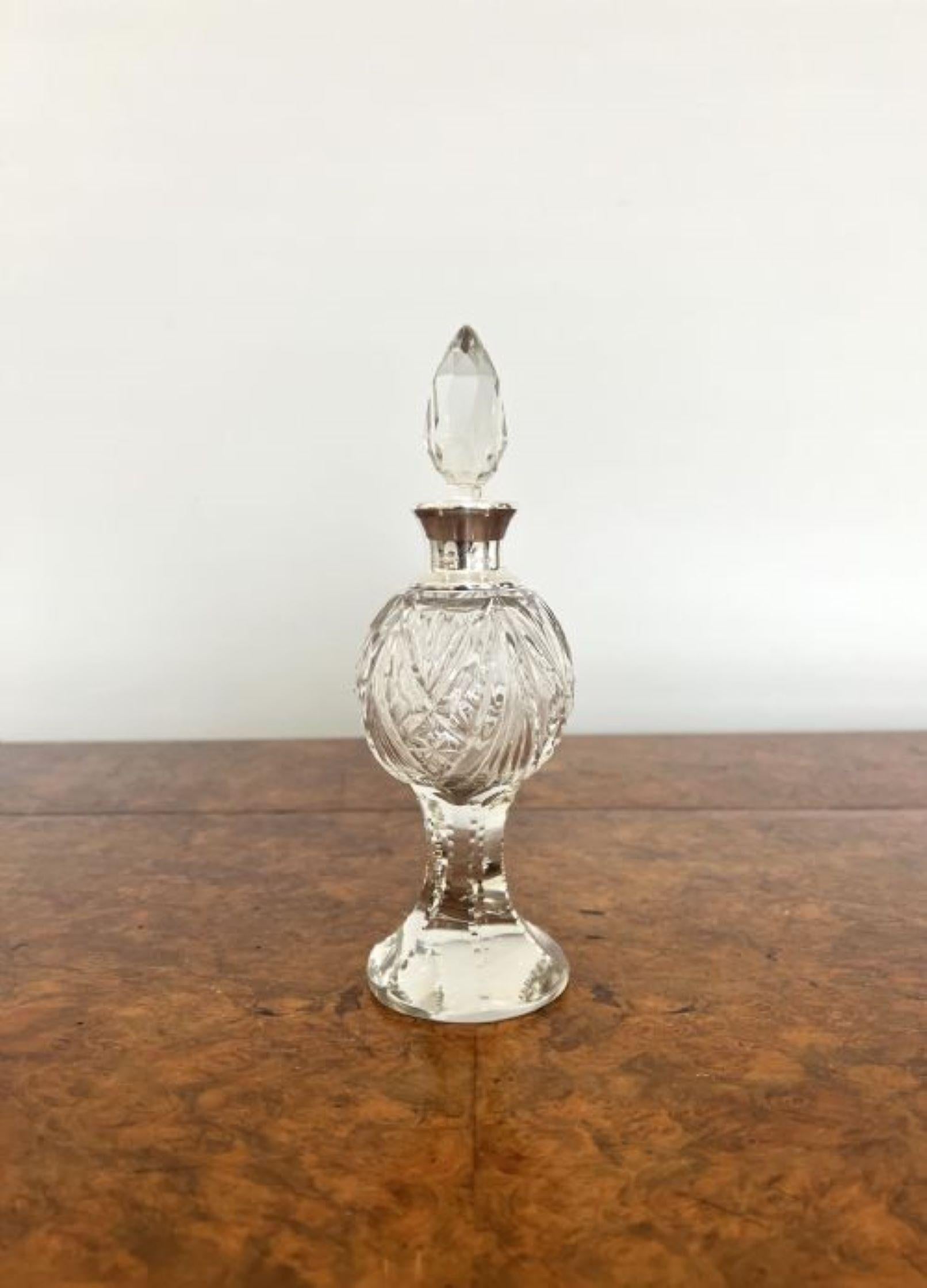 Fine quality antique Edwardian silver mounted cut glass bottle having a quality silver mounted cut glass bottle with a bulbous body raised on a circular base, a silver mounted collar with the original stopper. 