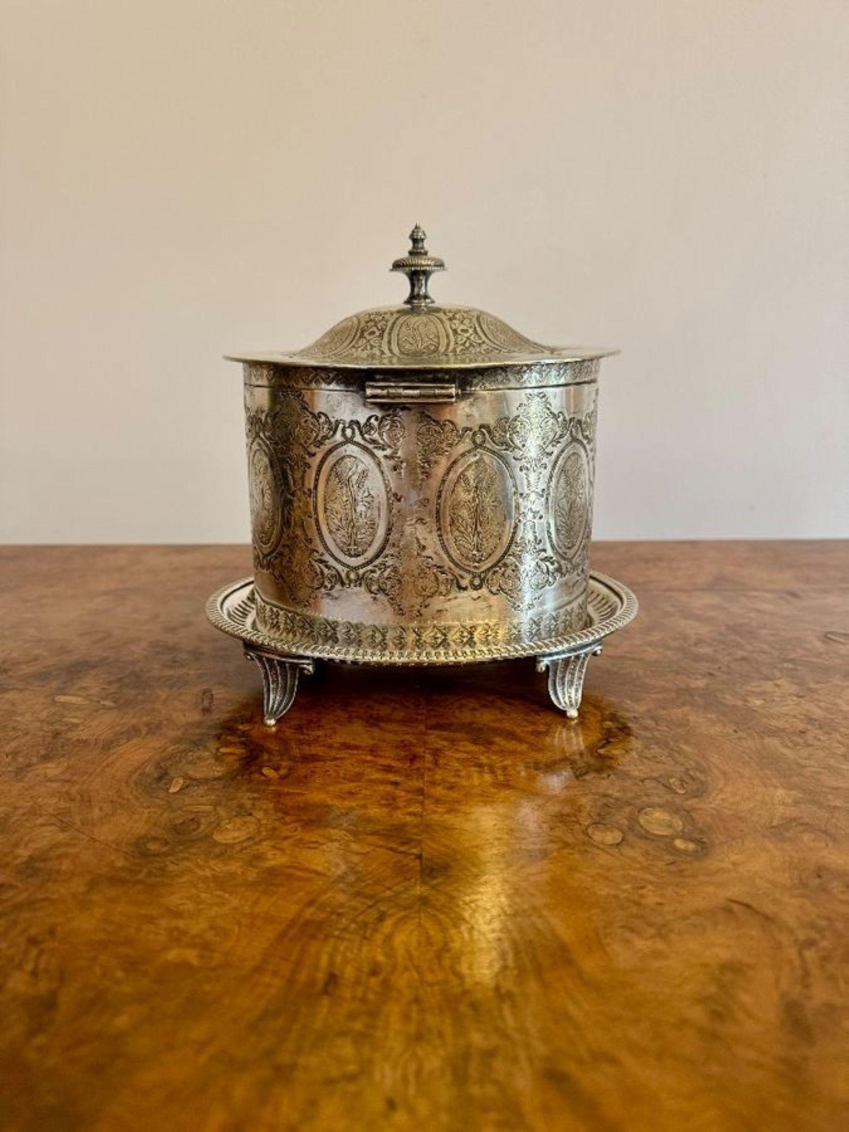 Fine quality antique Edwardian silver plated biscuit barrel having a quality antique Edwardian silver plated biscuit barrel with fantastic quality ornate detail throughout with a lift up lid opening to reveal a storage compartment with a oval shaped
