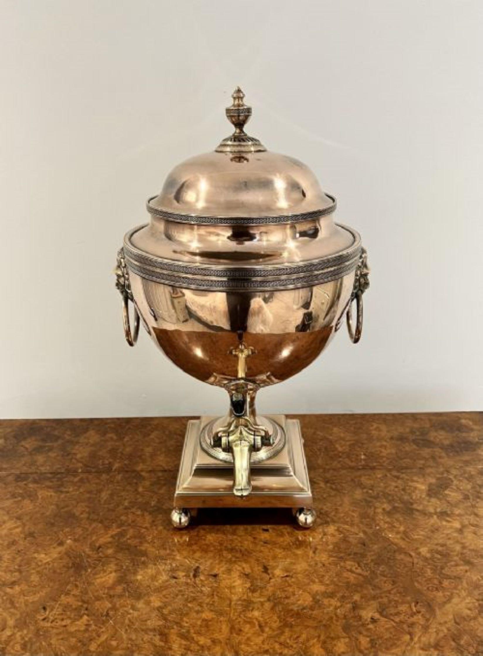 Fine quality antique George III large copper samovar having a quality George III large copper samovar with engraved decoration having a lift off lid, fantastic lions head ring carrying handles to the sides, a brass tap to the front standing on a