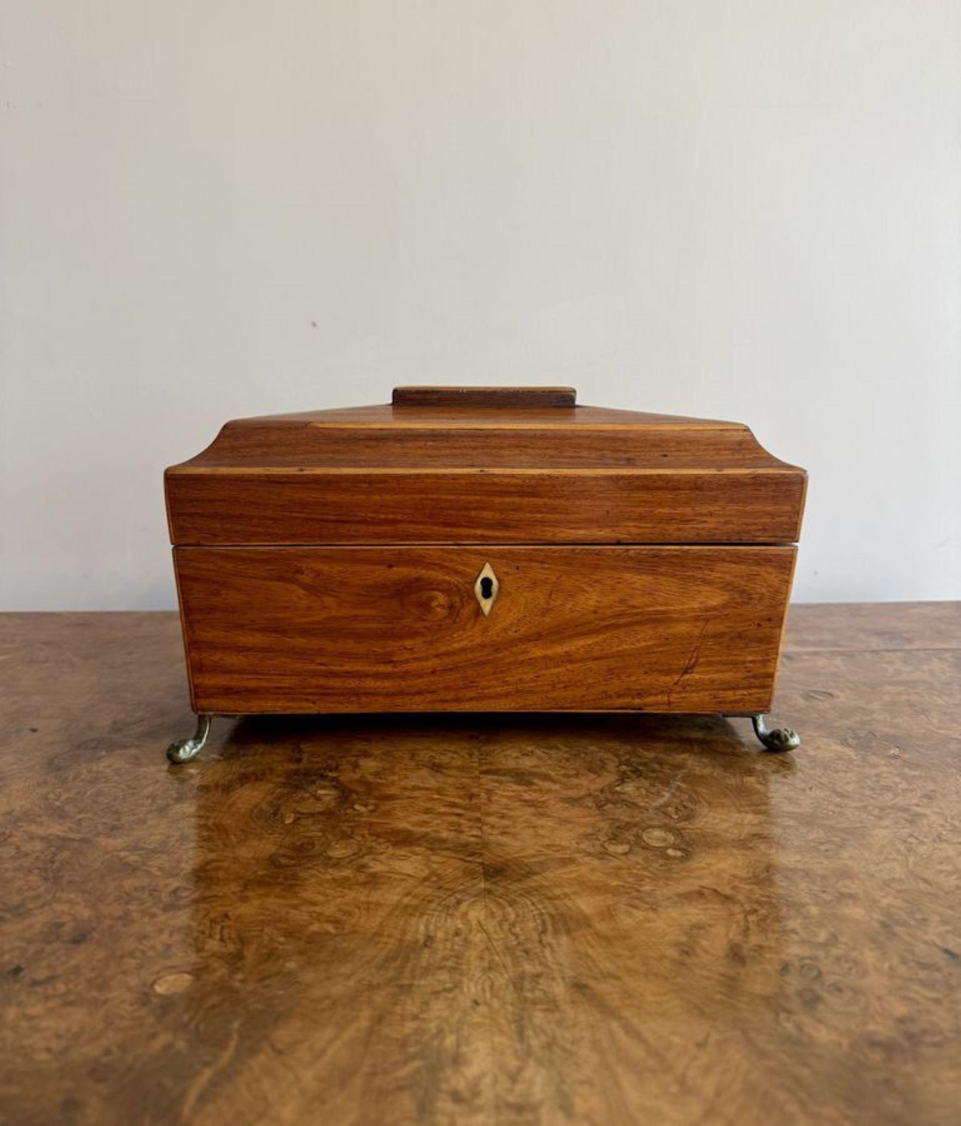 Fine quality antique George III tea caddy, having a quality antique George III satinwood tea caddy with a lift up lid opening to reveal two removable compartments for tea and a glass mixing bowl to the centre, having lion heads handles to the sides