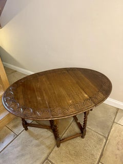 Fine quality antique oak drop leaf dining table