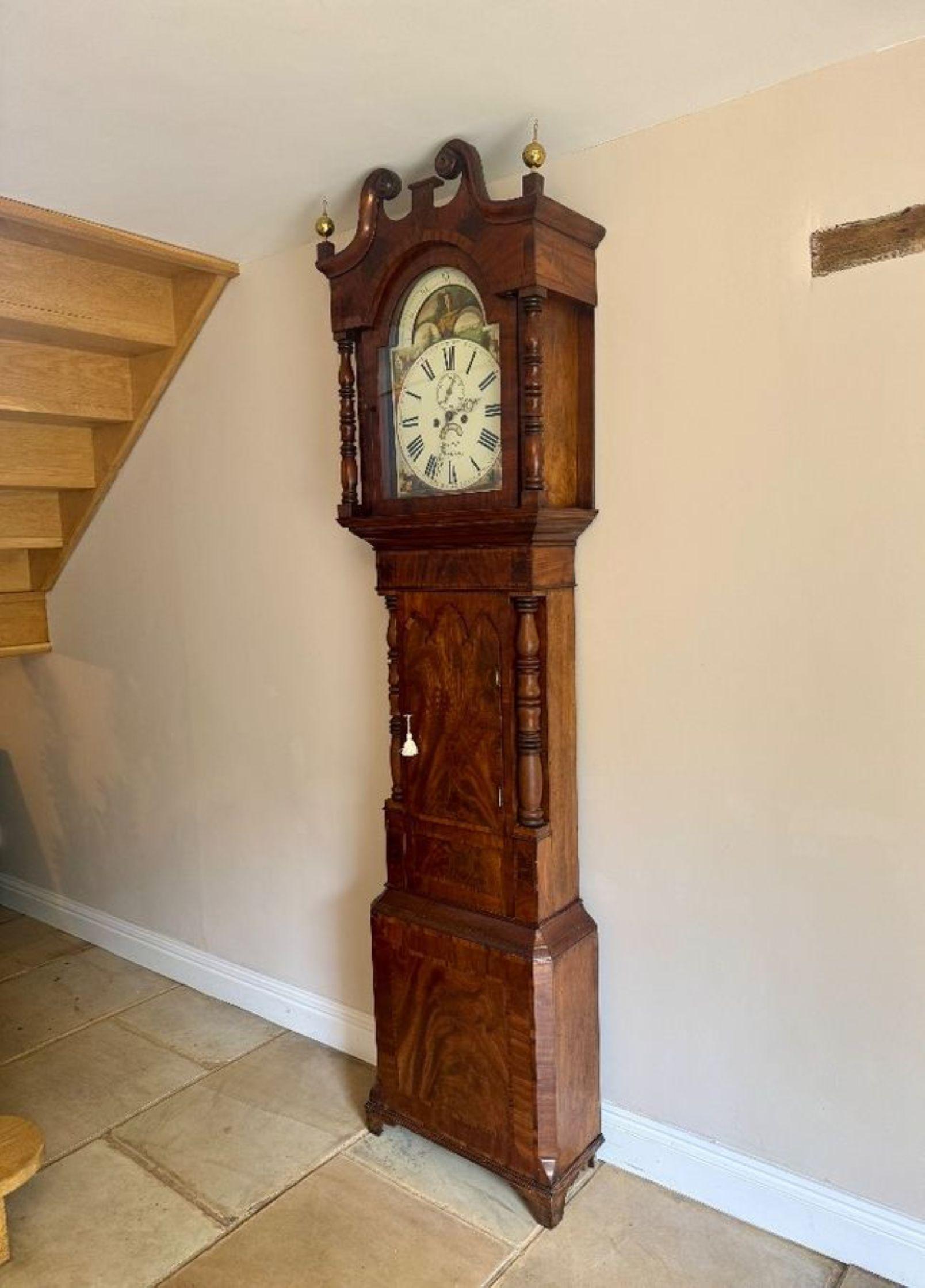 Fine quality antique Regency inlaid mahogany longcase clock, having a fine quality antique Regency longcase clock with a swan neck pediment with brass finales enclosing a broken arch painted dial with Roman numerals and maker 'John Bell' displayed,