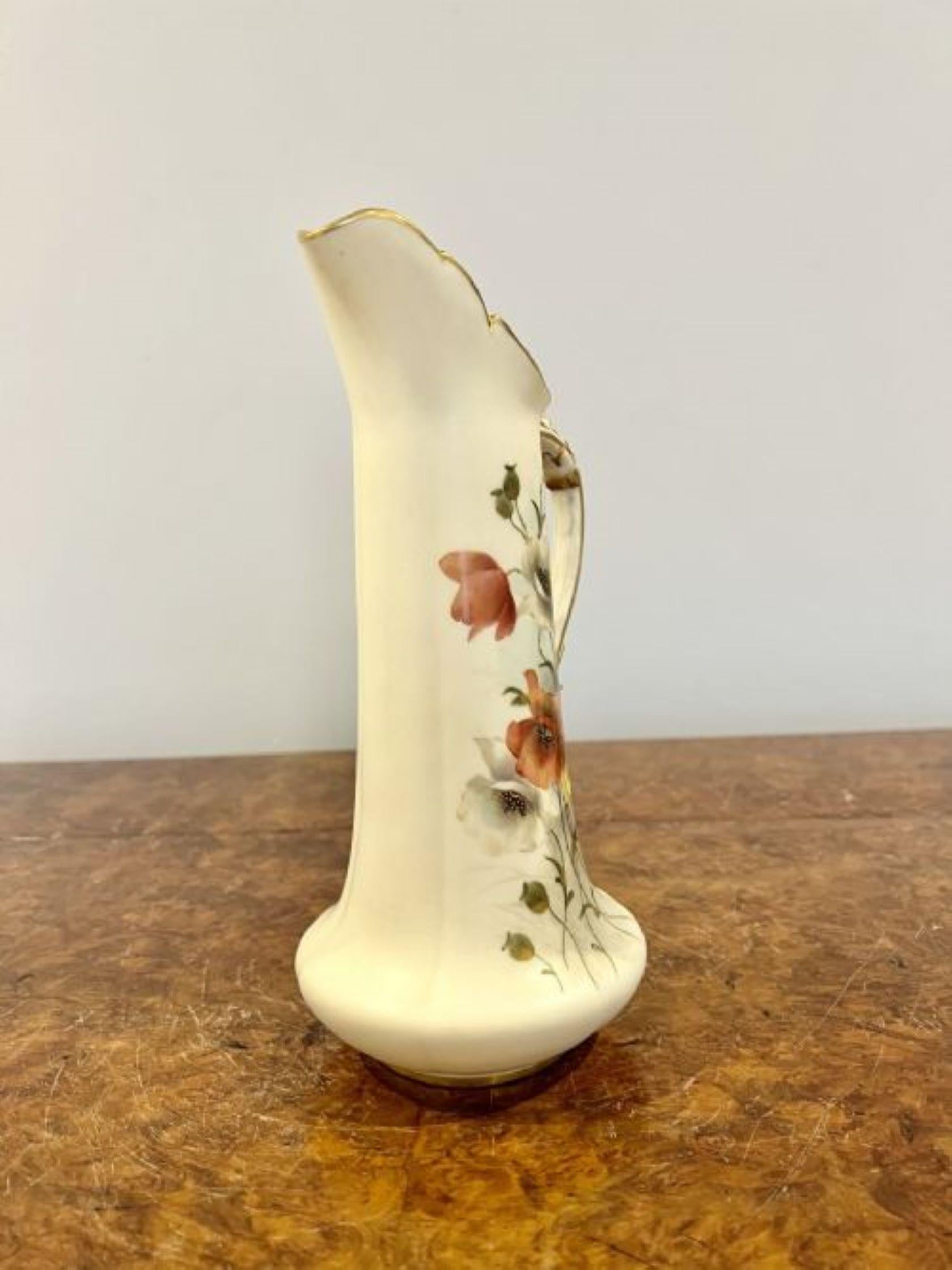 Fine quality antique Royal Worcester jug having a quality hand painted and gilded Royal Worcester jug with a lovely shaped gilded handle and a hand painted jug in wonderful red, yellow, gold and green colours decorated with flowers and leaves.
