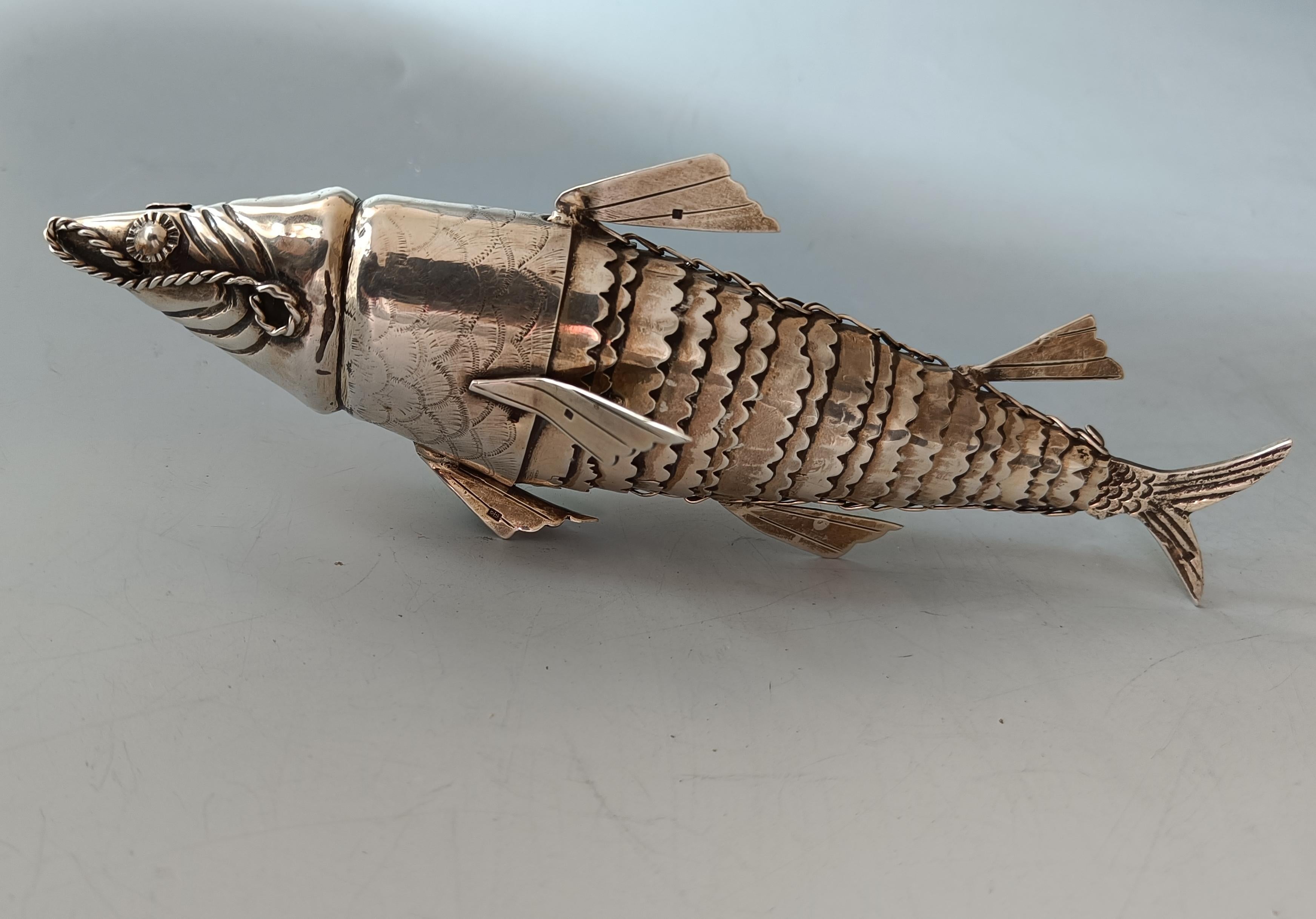 Fine quality Antique Silver articulated fish Hallmarked
A very fine quality Articulated silver fish model
Expertly crafted with beautifully detailed silver workmanship,   
Hallmarked in various places with makers mark and symbols probably Egypt 