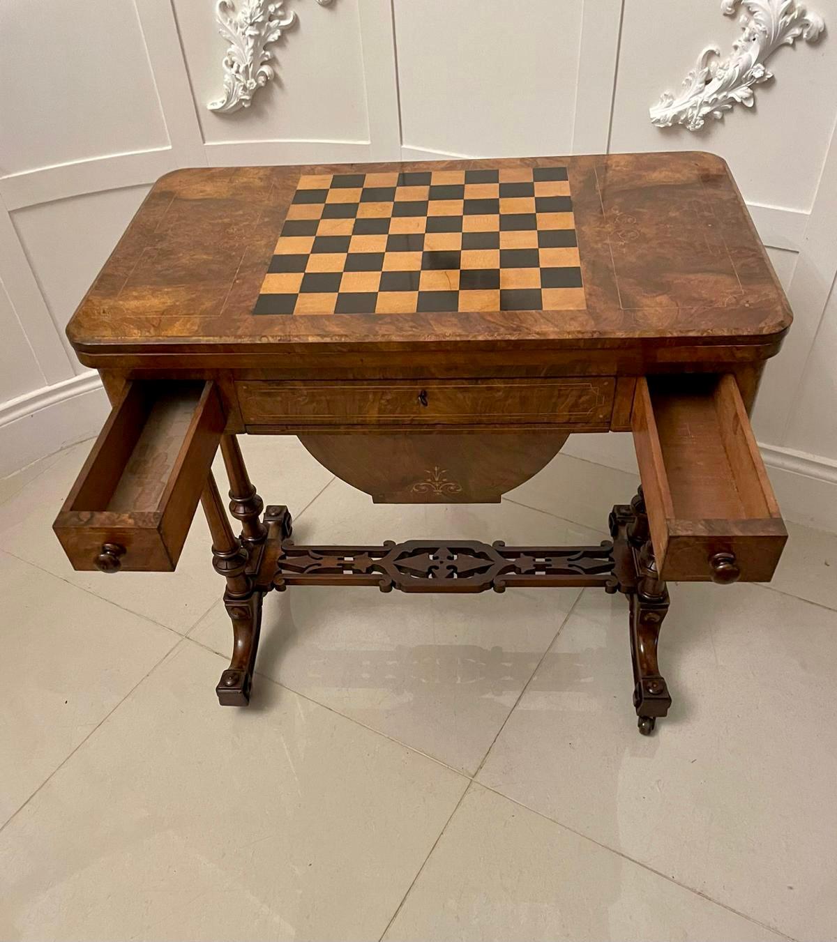 Fine quality antique Victorian burr walnut inlaid games table having a quality burr walnut inlaid chess board, fold over top opening to reveal a green baize interior above three frieze fitted drawers with original turned walnut knobs above a sliding