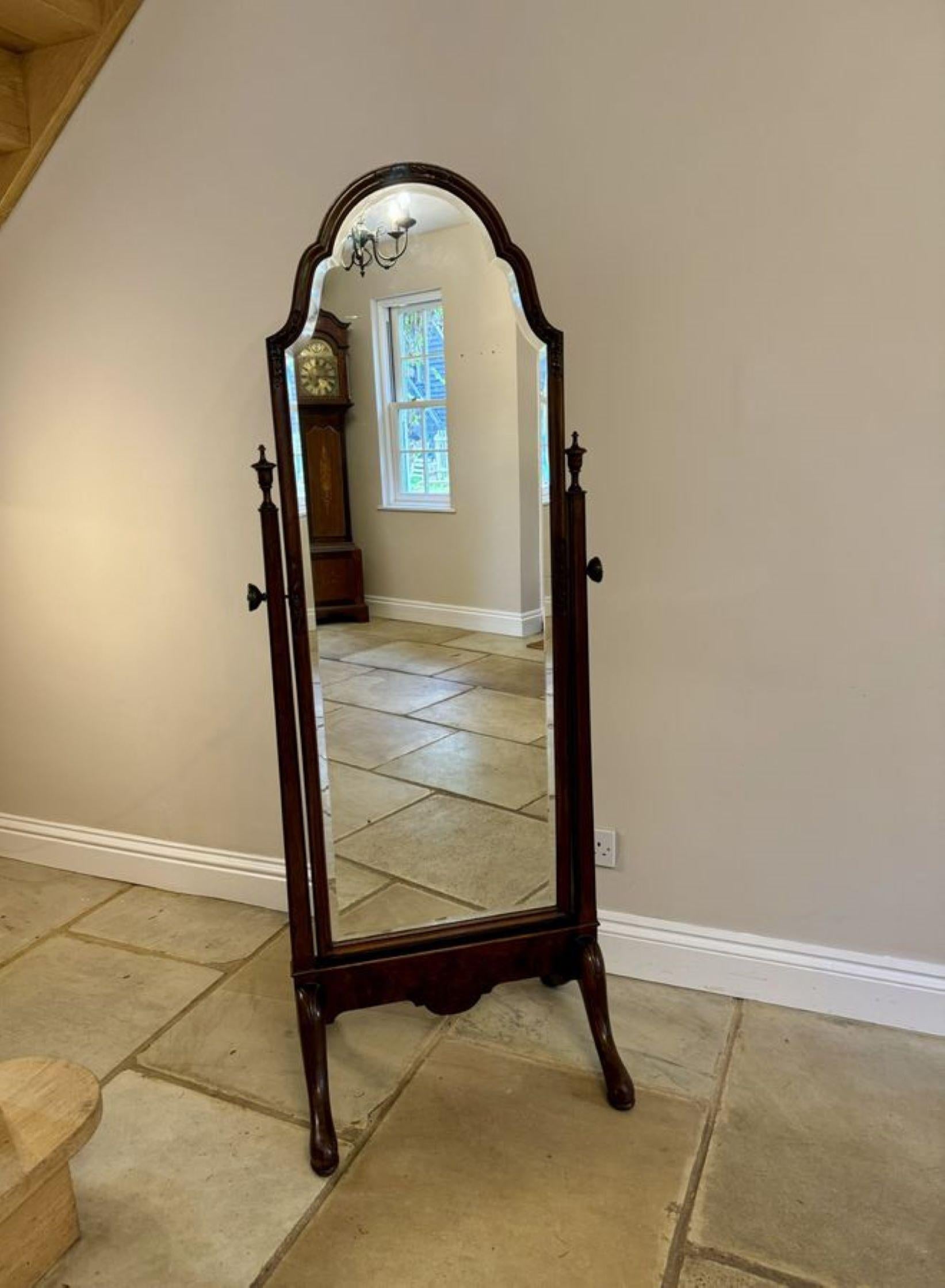 Fine quality antique Victorian carved walnut cheval mirror, having the original bevelled mirror plate in a shaped top, quality solid walnut frame with a moulded edge and beautiful floral carved decoration, supported by slender supports with elegant