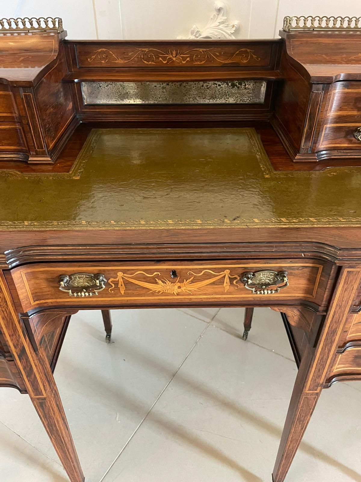 Fine quality Victorian freestanding Maple & Co. inlaid writing desk having original pierced brass galleries, mirror to the centre with a pretty inlaid rail above flanked by two faux drawers to the right, one faux and one opening drawer to the left
