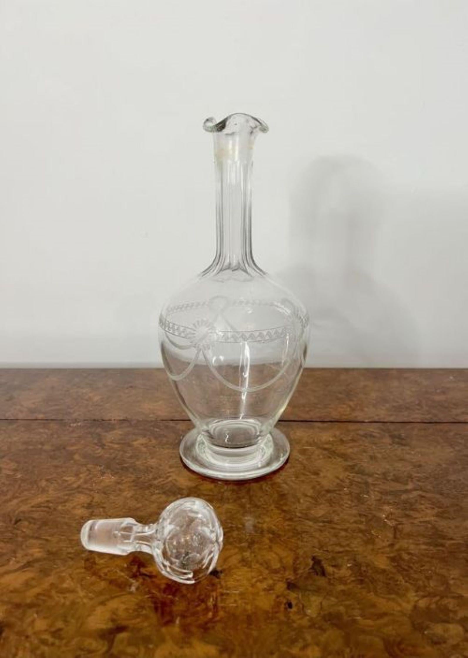 Fine quality antique Victorian decanter having an elegant antique Victorian decanter with a lovely wavy shaped top, a rounded body standing on a circular base with the original cut glass stopper. 
