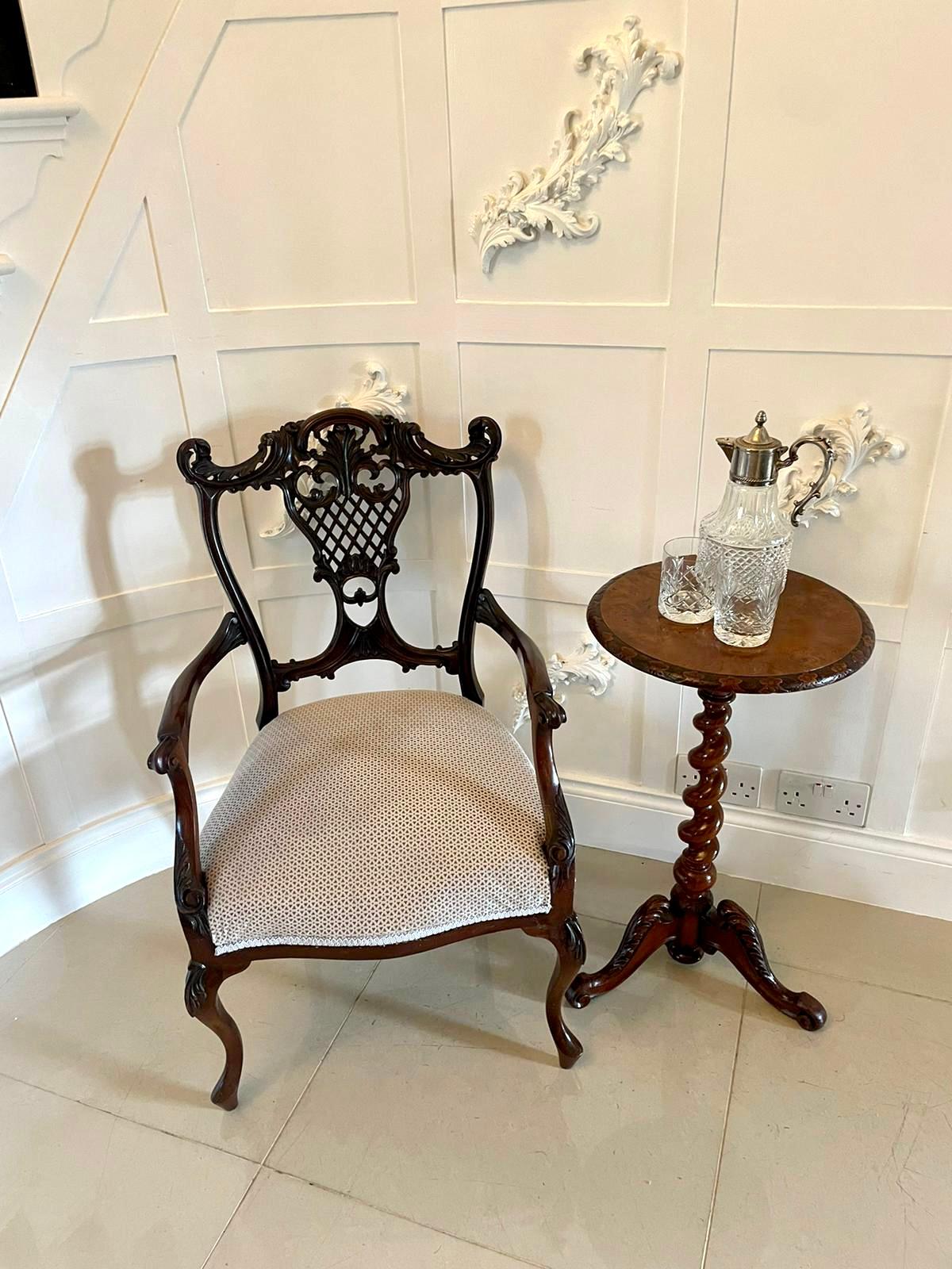Fine quality Victorian carved mahogany arm/desk chair having a beautiful carved pierced shaped back, shaped carved open arms and standing on carved cabriole feet and out swept back legs. Newly upholstered in a quality grey fabric.

A handsome