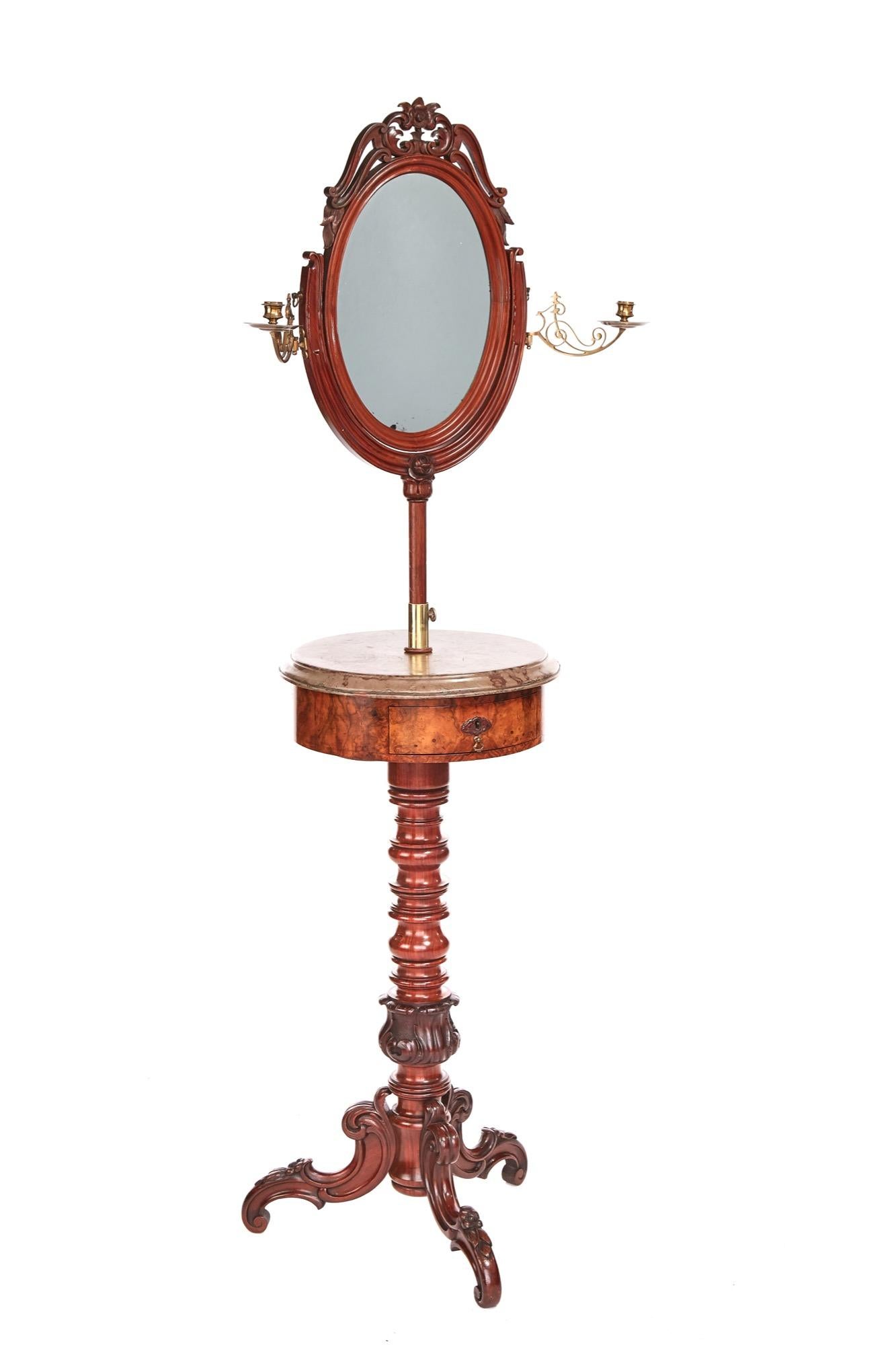 Fine quality antique victorian telescopic dressing stand having an oval mahogany framed swing mirror, with ornate carving on top, supported by a U shaped telescopic frame with brass candle sconces each side, a mottled circular marble top with single