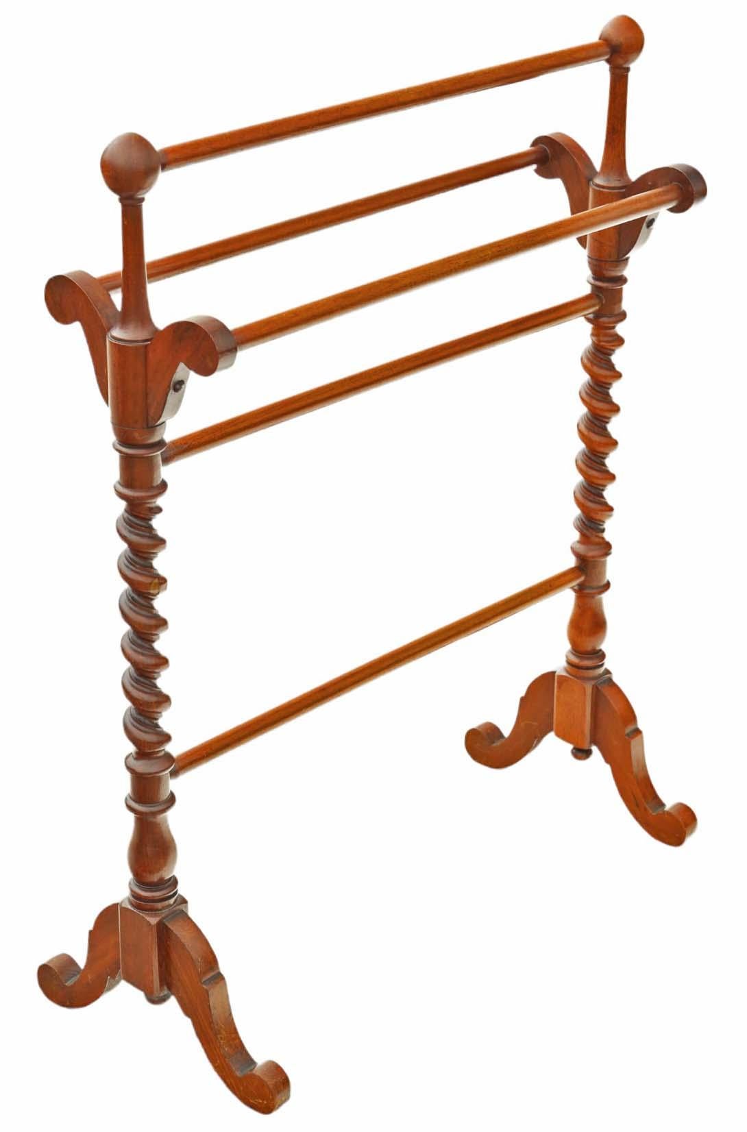 Introducing a fine quality Antique Walnut Twist Victorian Towel Rail Stand from the 19th Century.

This piece features solid construction with no loose joints and no signs of woodworm, ensuring durability.

Bound to make a striking statement in the
