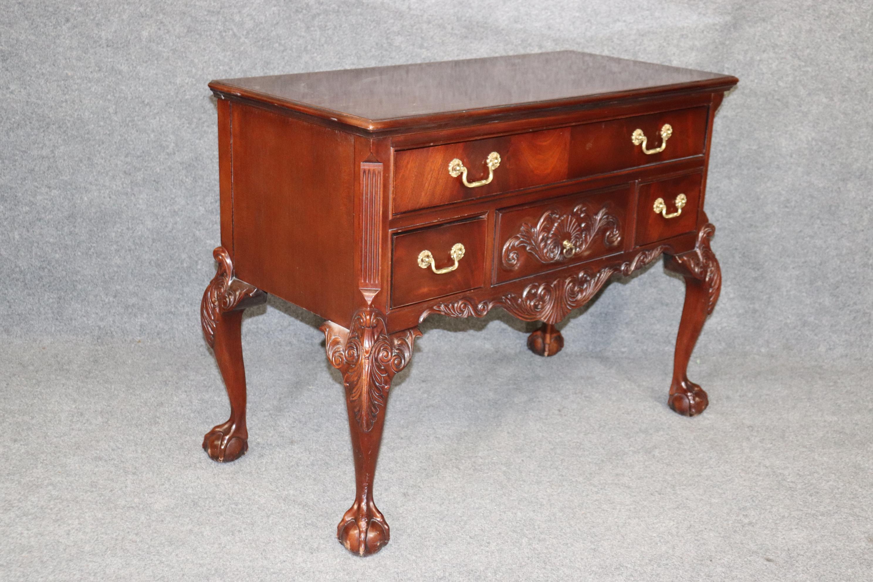 This is a superb quality flame mahogany chippendale style lowboy or buffet from the 