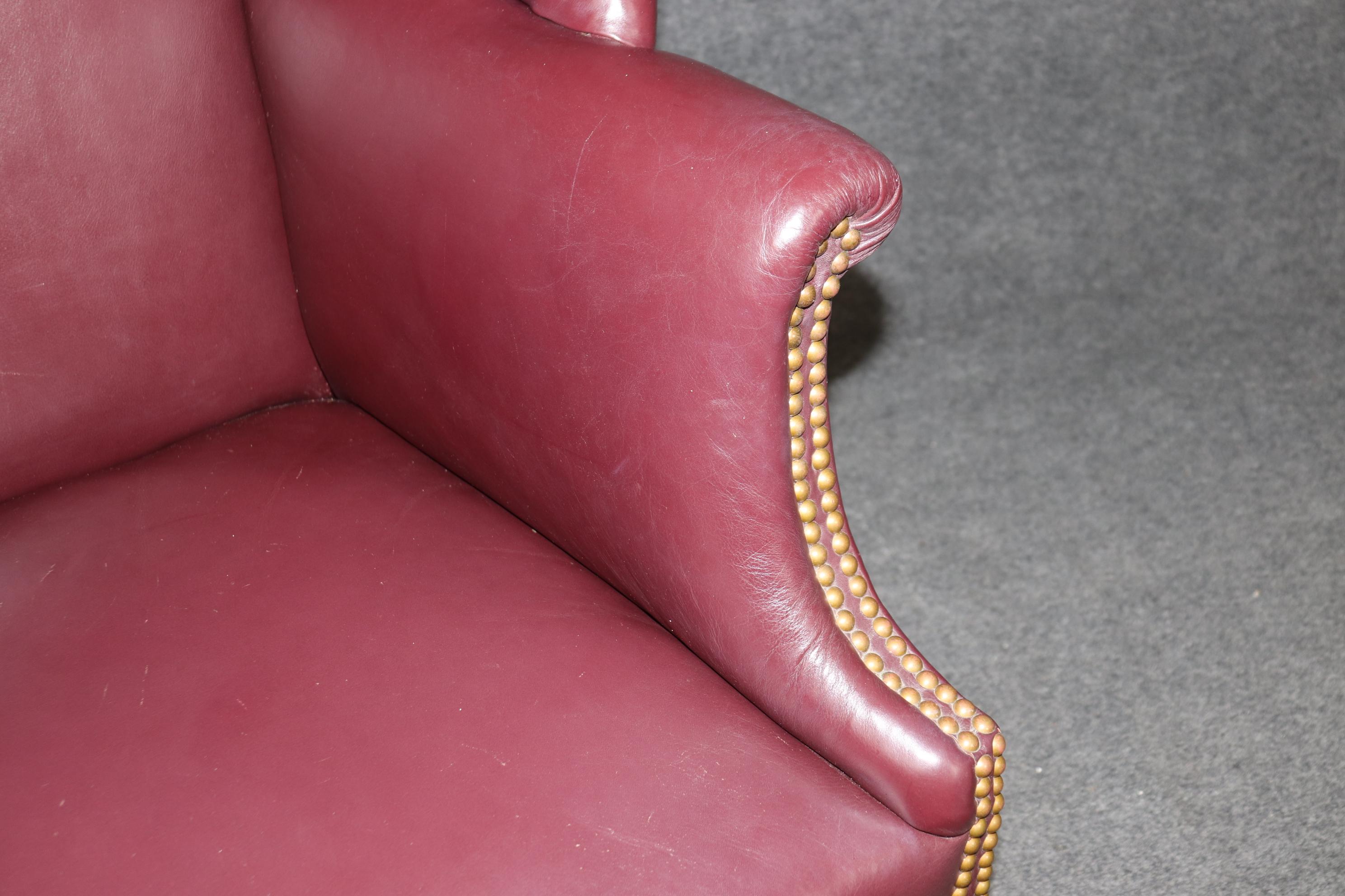 Mid-20th Century Fine Quality Burgundy Leather nail Head Trim Chippendale Mahogany Wingchair For Sale