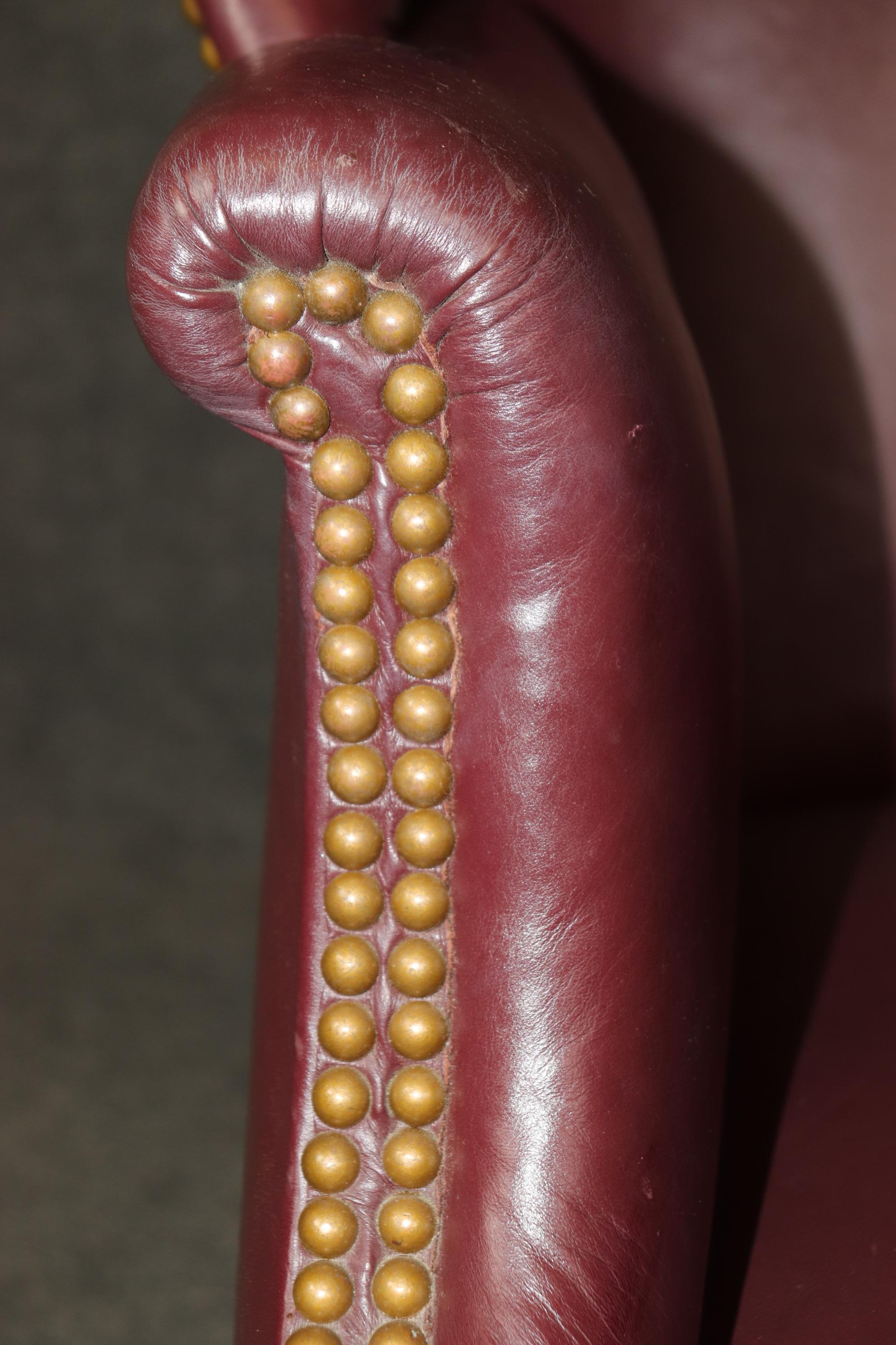 Fine Quality Burgundy Leather nail Head Trim Chippendale Mahogany Wingchair For Sale 2