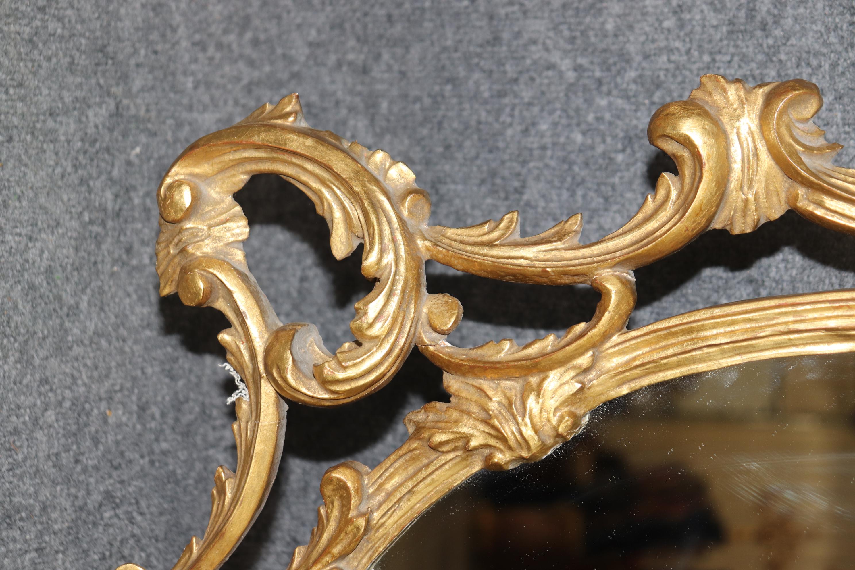 Mid-20th Century Fine Quality Carved Italian Giltwood Mirror with Shell Motif Atop.  For Sale