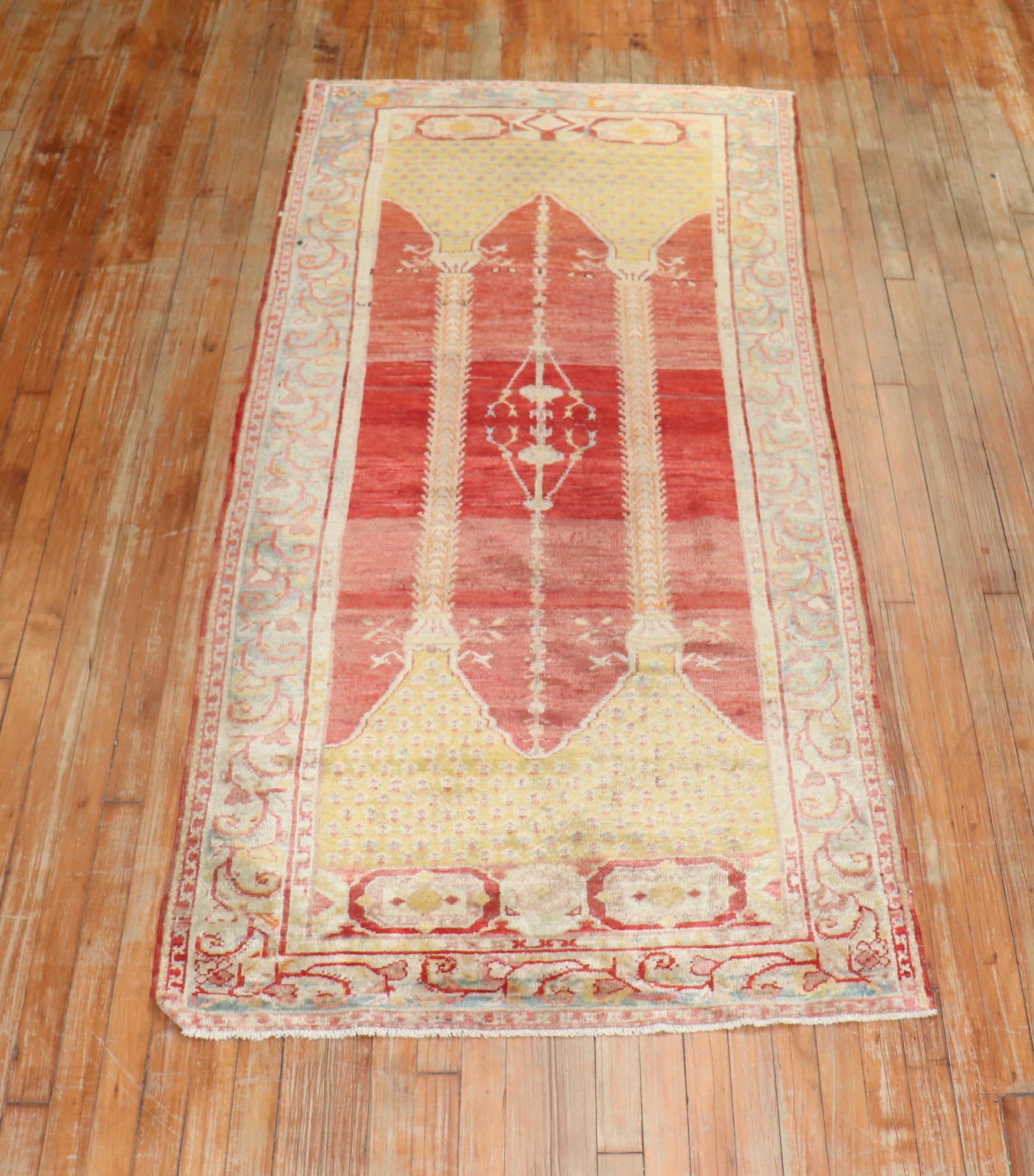 An early 20th century Turkish Sivas runner with a double column scroll motif on an a soft red field.

Measures: 3'5