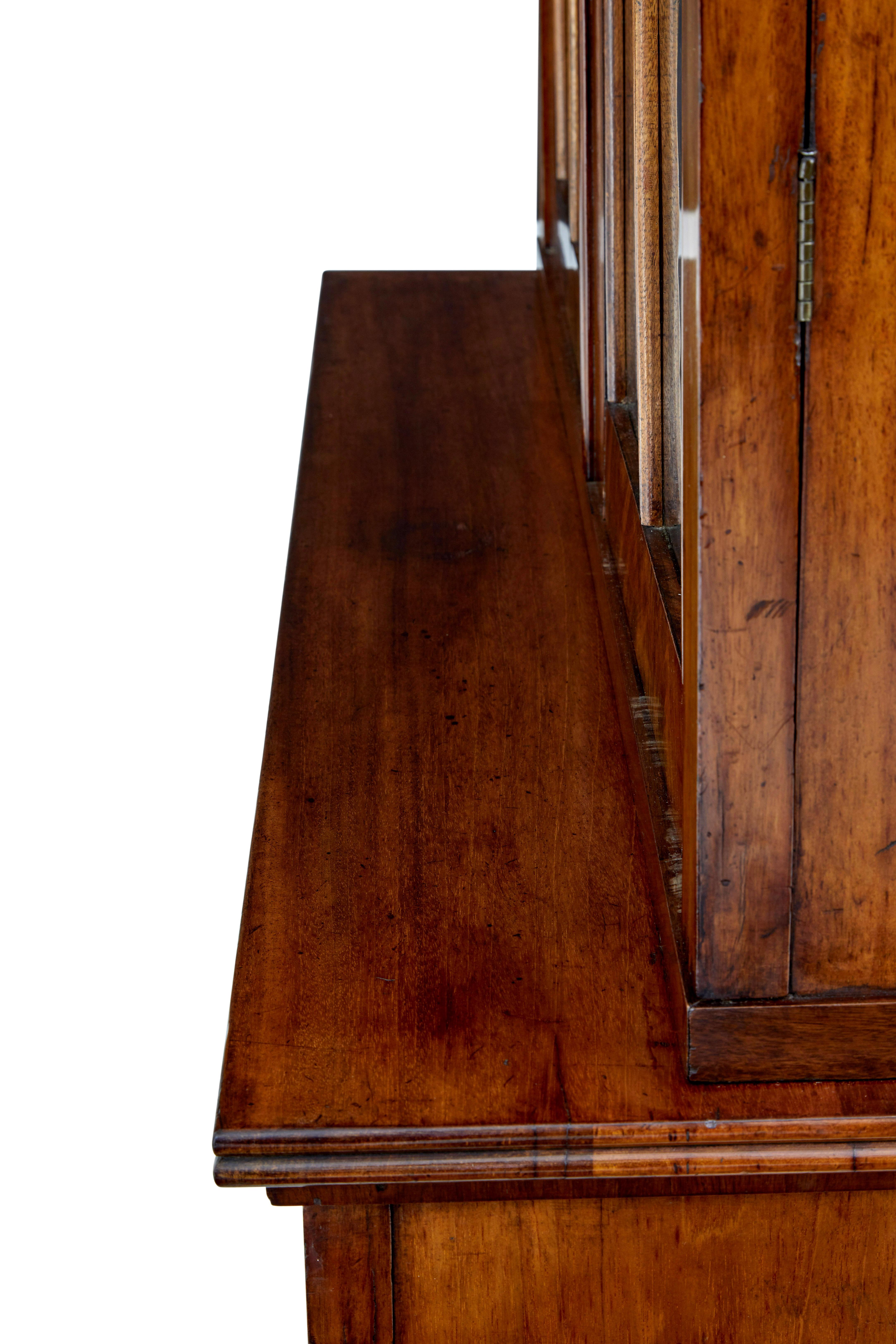 Glass Fine quality early 19th century flame mahogany bookcase For Sale