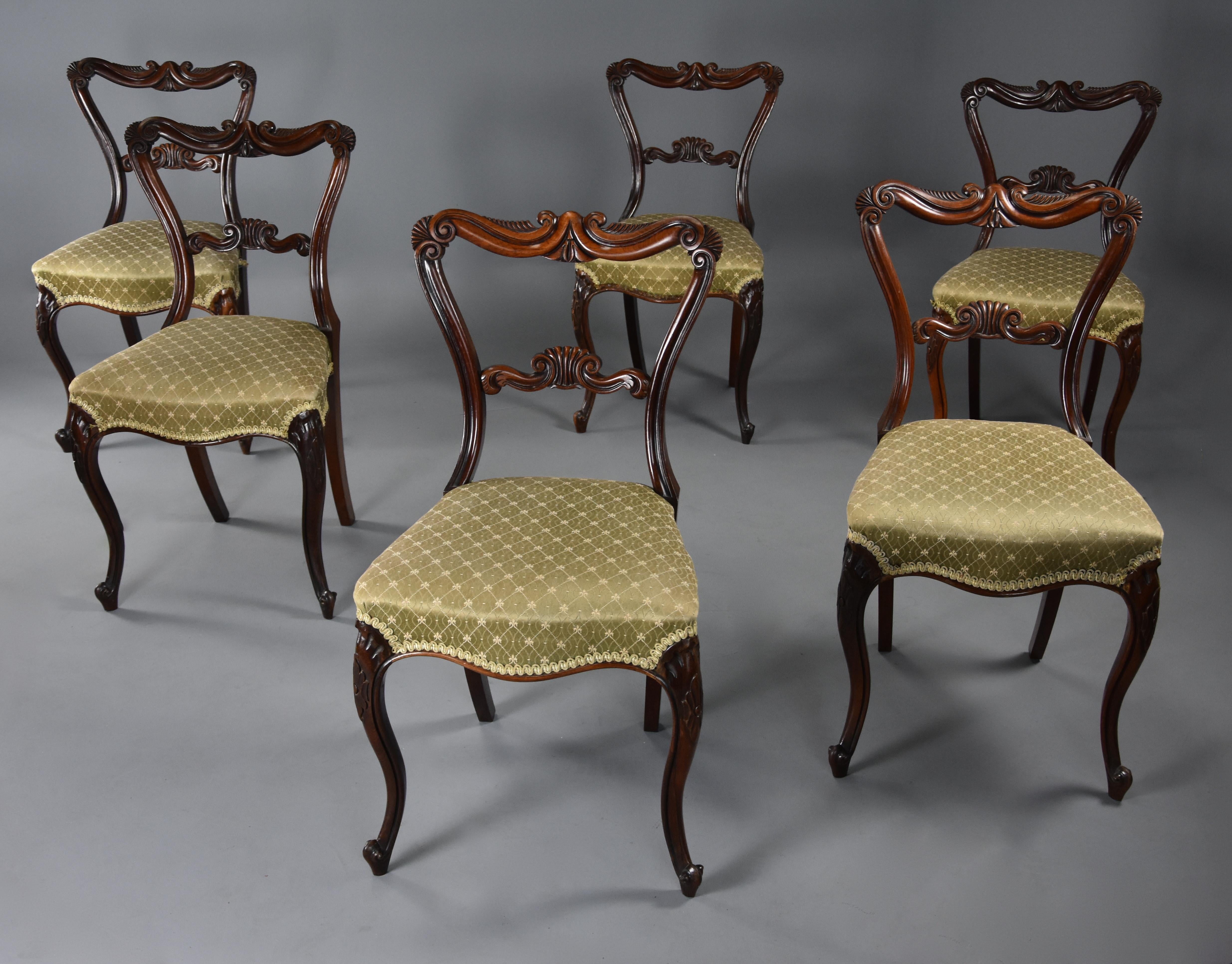 A fine quality early to mid-19th century (circa 1840) set of six rosewood dining chairs in the manner of Gillows.

This set of chairs consist of a finely carved top rail with scroll and fan decoration, a shaped and carved back support and shaped