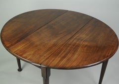 Fine Quality Figured Mahogany Oval Drop Leaf Dining Table