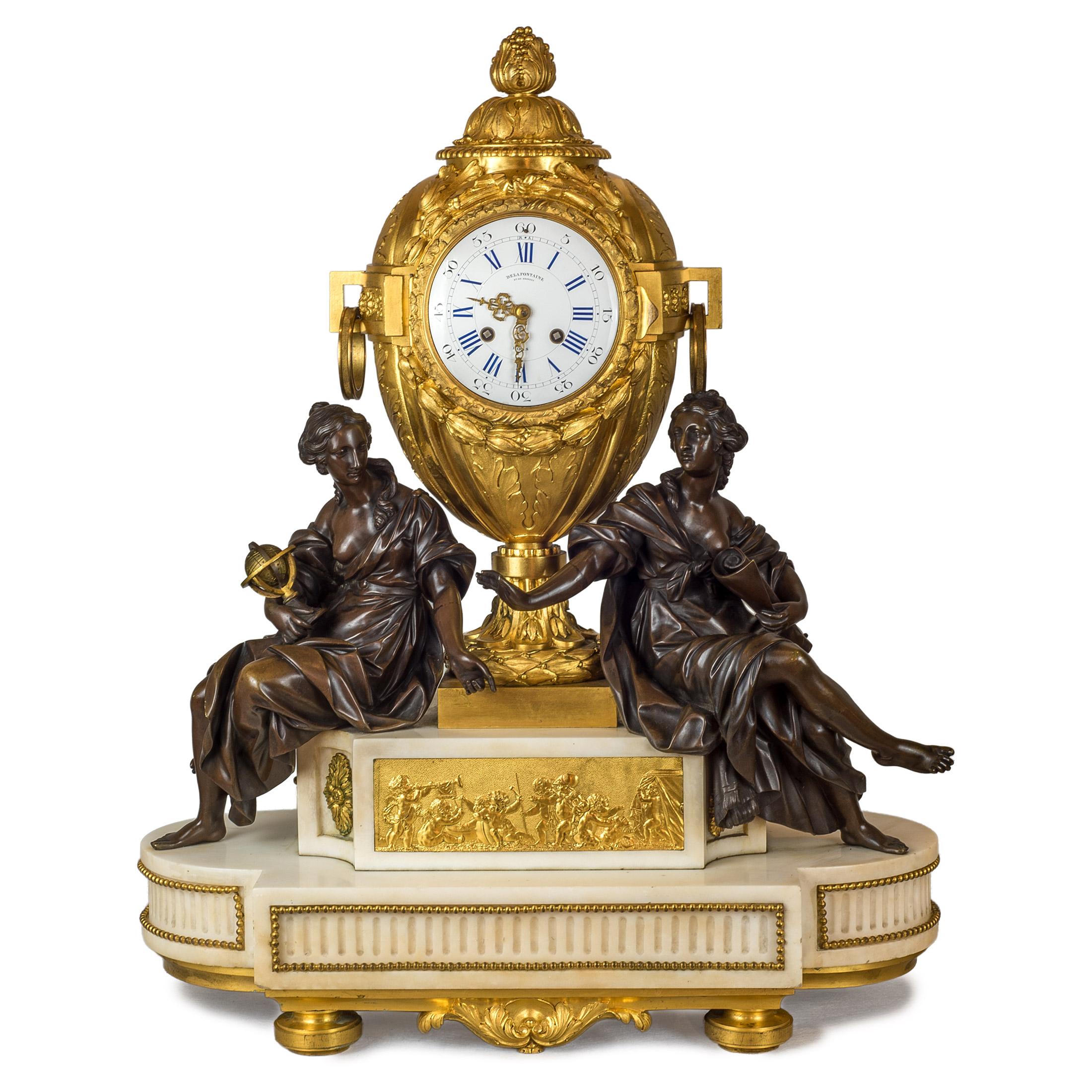 A fine quality French ormolu and patinated bronze and white marble clock set with cherubs holding the candelabras and large central clock with two female figures one holding a globe and the other a scroll. Clock face marked ‘De La Fontaine