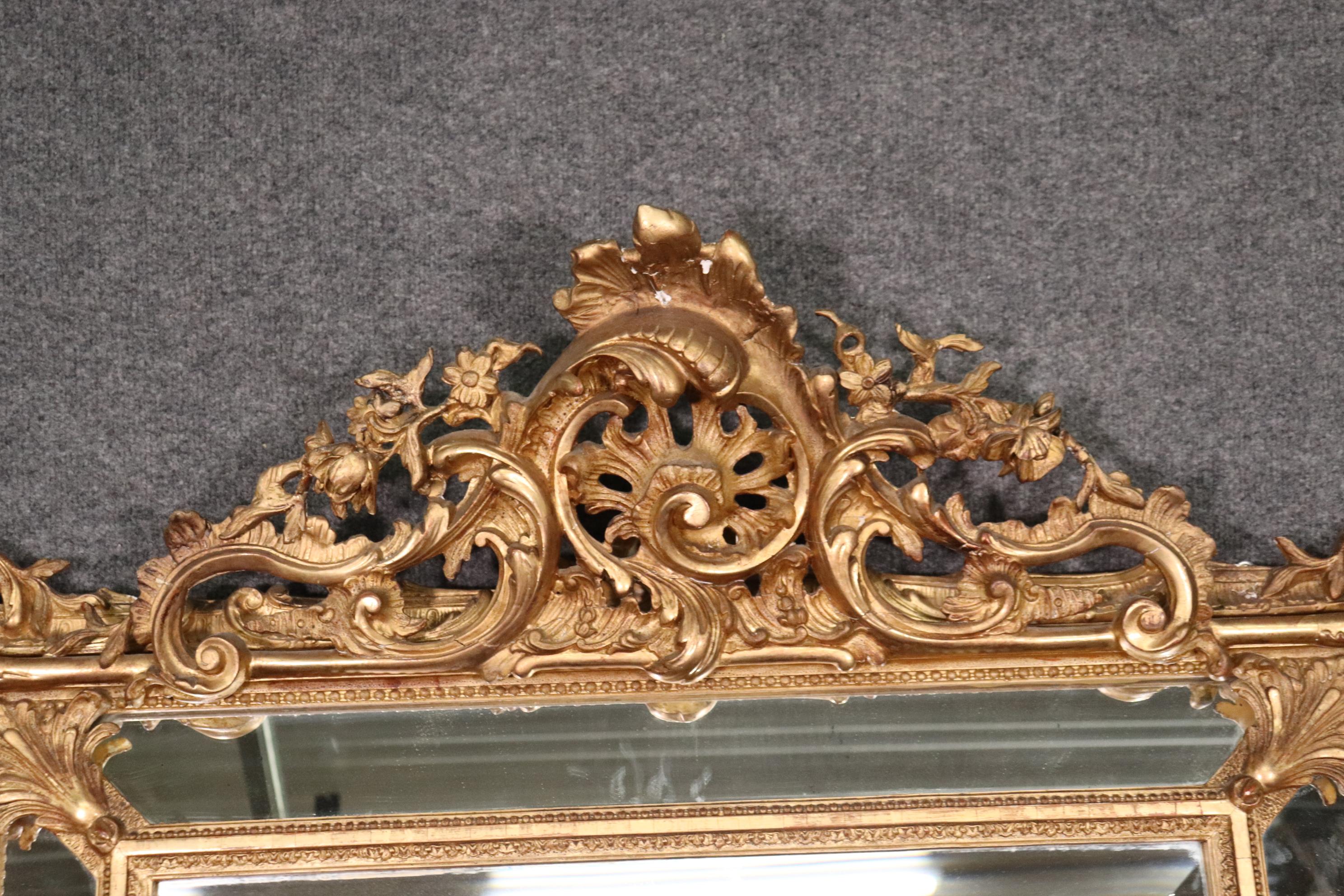 Fine Quality Gilded French Louis XV Carved French Mantle Buffet Wall Mirror In Good Condition In Swedesboro, NJ