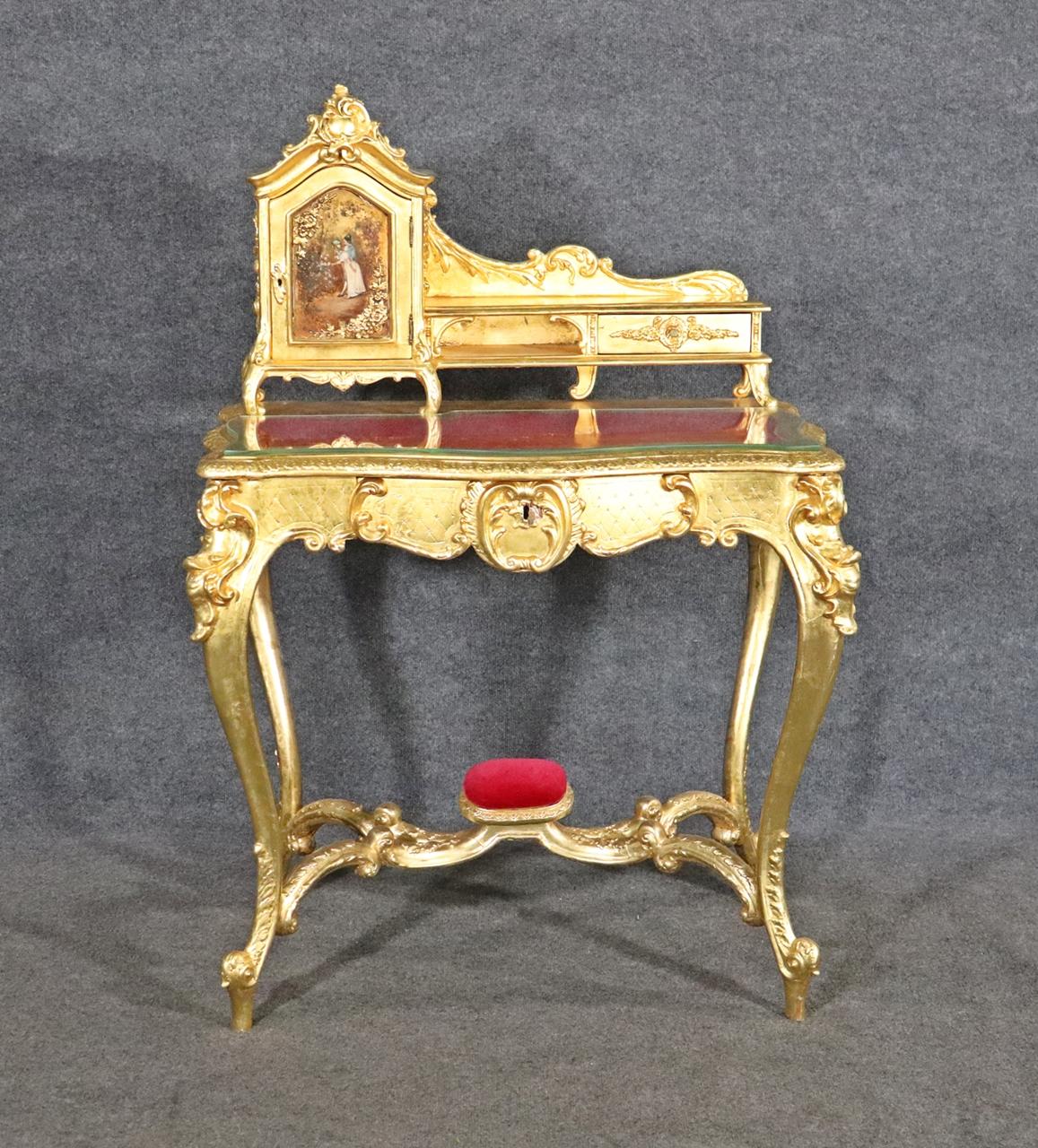 Gilt. Glass top. Removable top compartments. 48 1/2