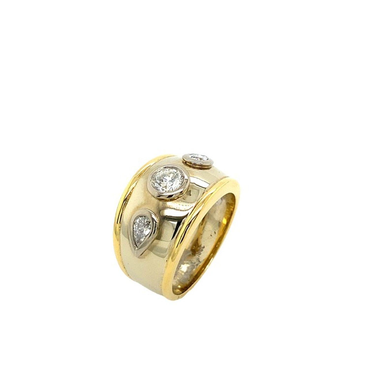 Fine Quality 18ct Yellow & White Gold 3 Stone 0.60ct G VS Diamond Ring

Additional Information:
Total Diamond Weight: 0.60ct 
Weight of Round Brilliant Cut Diamond: 0.35ct 
Colour of Round Brilliant Cut Diamond: G 
Clarity of Round Brilliant Cut