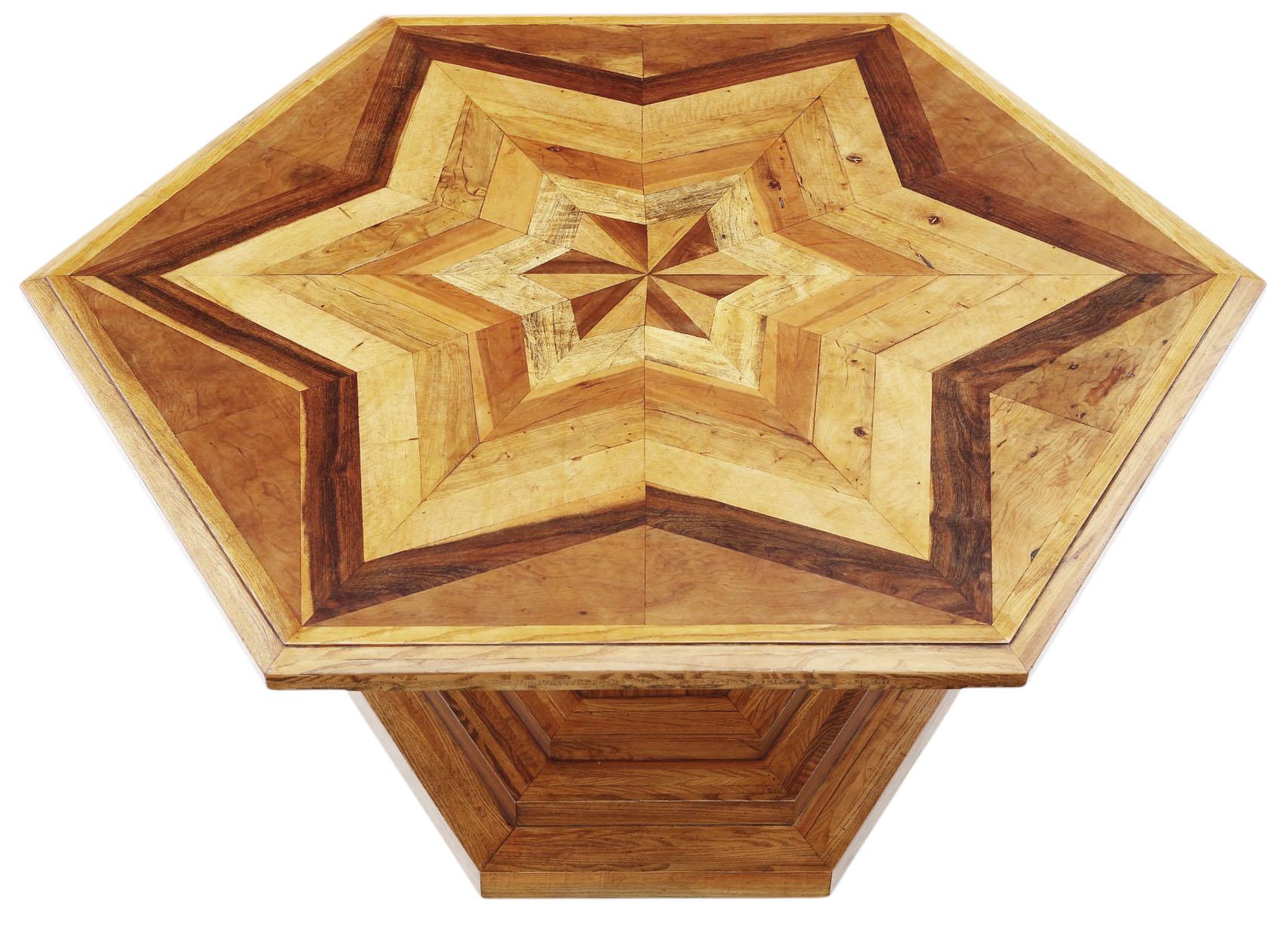 Fine Quality Hexagonal Parquetry Centre Dining Table – Large Statement Display Piece

A superb hexagonal star-decorated parquetry centre dining table, bespoke and handmade by renowned craftsperson Richard Wallace. Dating from the late 20th century,