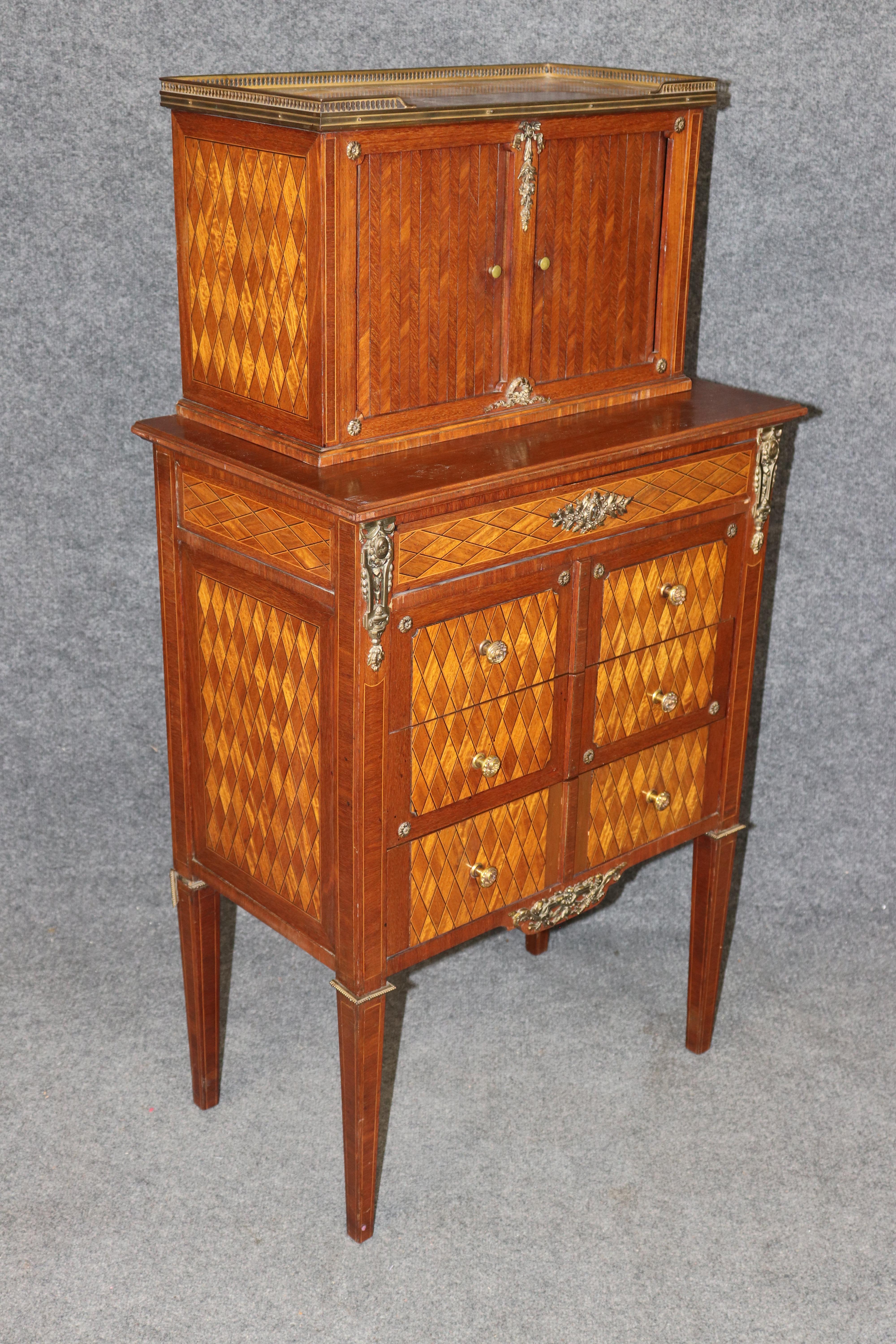This exquisite French Louis XVI secretary desk embodies the refined elegance and timeless craftsmanship of 18th-century design. Beautifully constructed in mahogany with intricate marquetry inlay, the piece showcases a harmonious blend of symmetry,