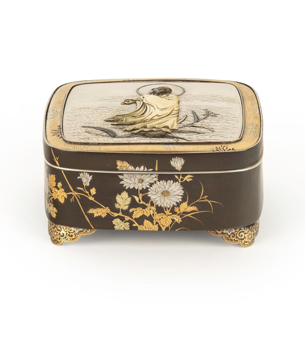 As part of our Japanese works of art collection we are delighted to offer this very finely worked Meiji Period (1868-1912) mixed metal lidded box, that we confidently attribute to Kajima Ikkoku II. The large size square form bronze box stands upon