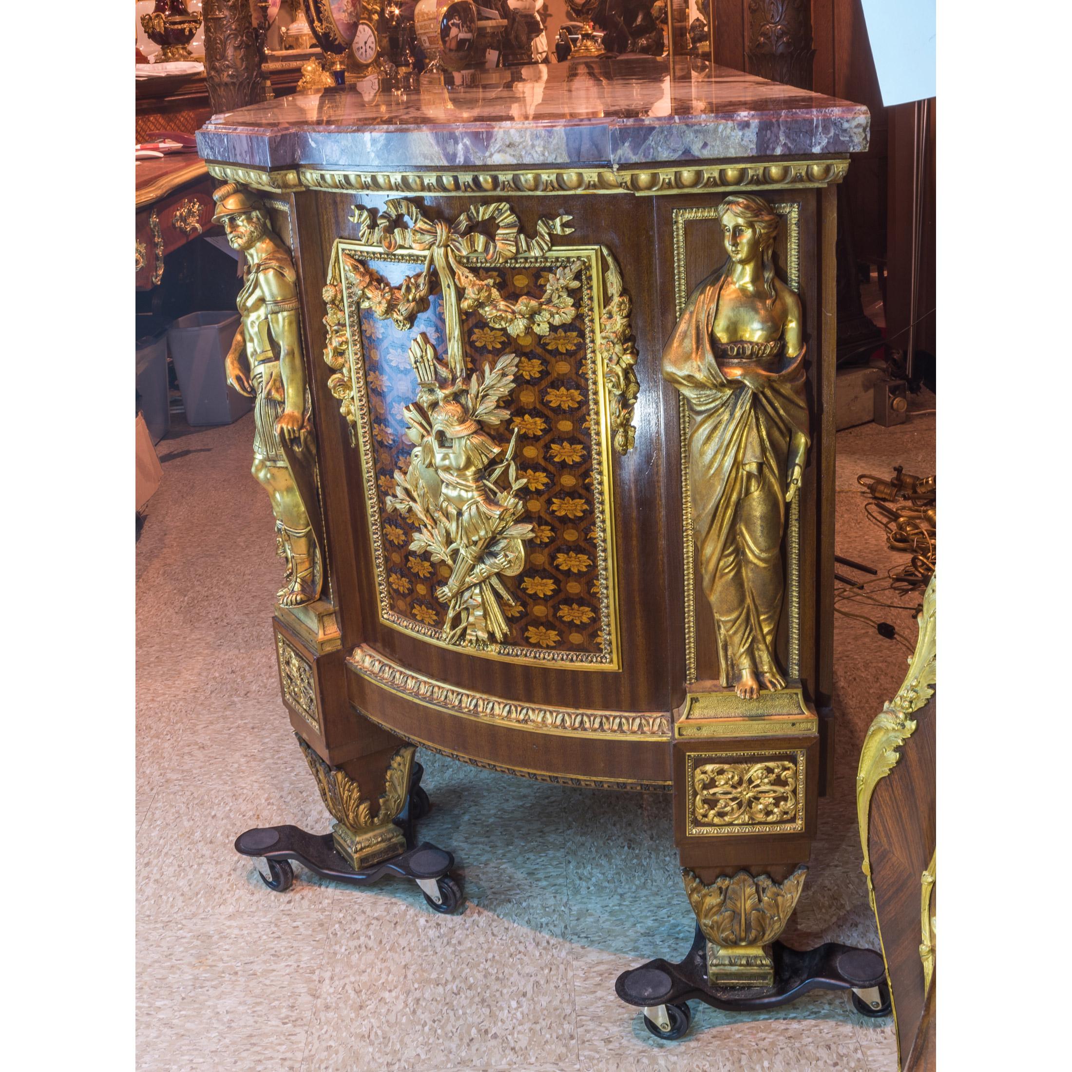 Stunning Louis XVI style gilt bronze mounted, mahogany and fruitwood marquetry and parquetry, armorial commode with marble top, after a model by Jean-Henri Riesener

Origin: French
Date: circa 1880
Dimension: 38