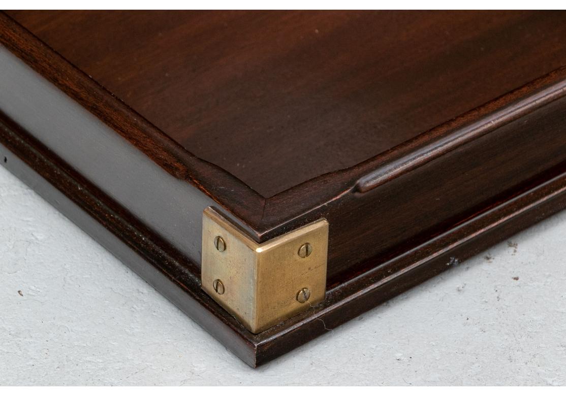 Best as a low table top. A square tray in a fine satin finish with twin pierced handles and brass corners. 

Dimensions: 30 1/4 x 30 1/4