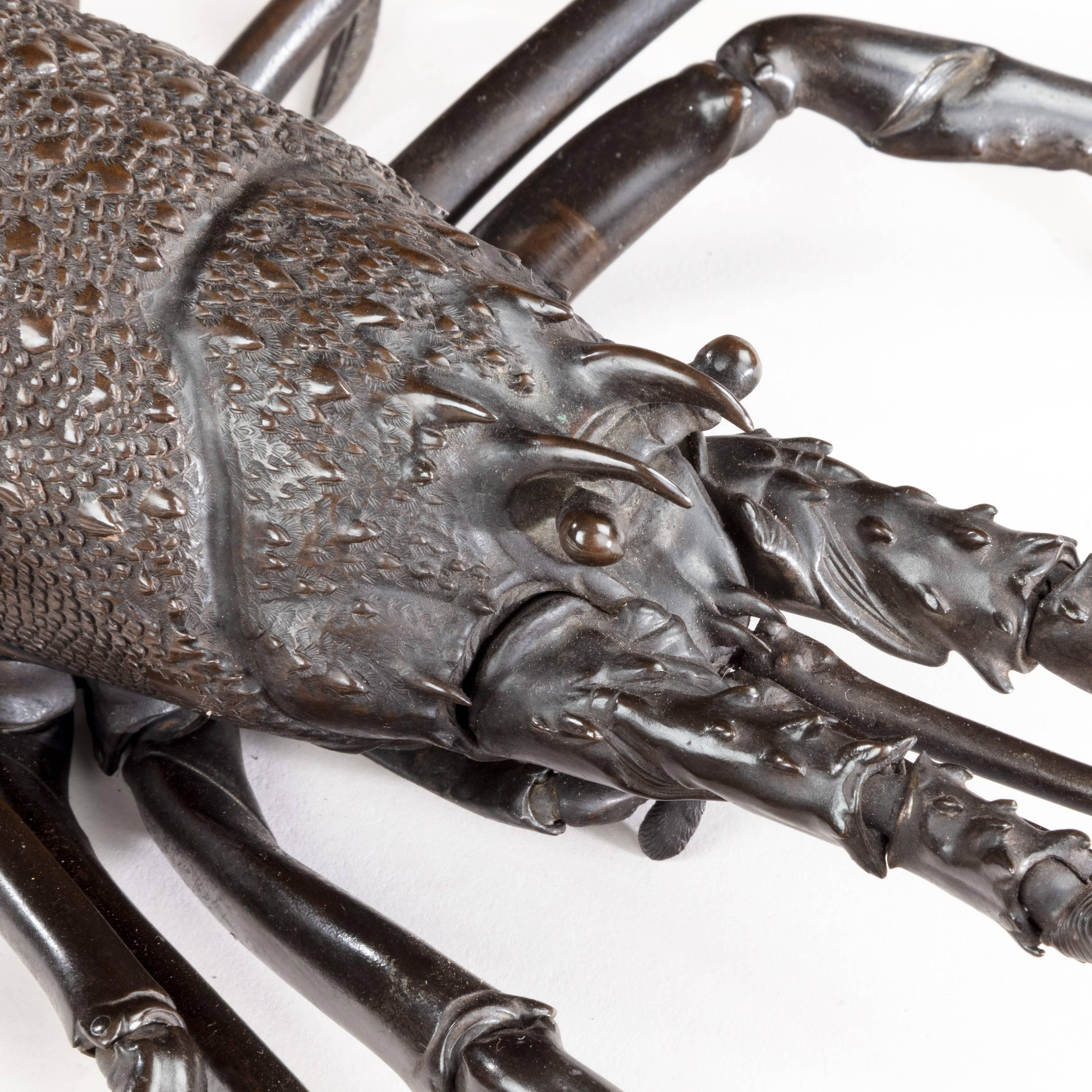 A fine quality Meiji period bronze okimono of a lobster, realistically modelled and fully articulated. Japanese, circa 1890.
Measure: L 16” (41cm).