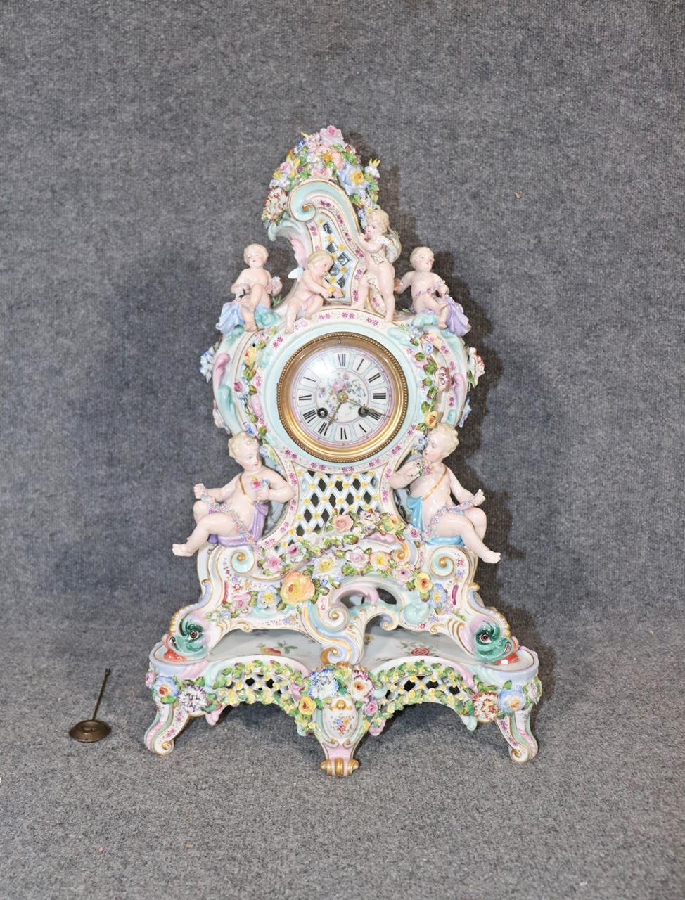 Meissen porcelain. Pain decorated. Figural. Removes from base. Floral detail. Measures: 23 1/2