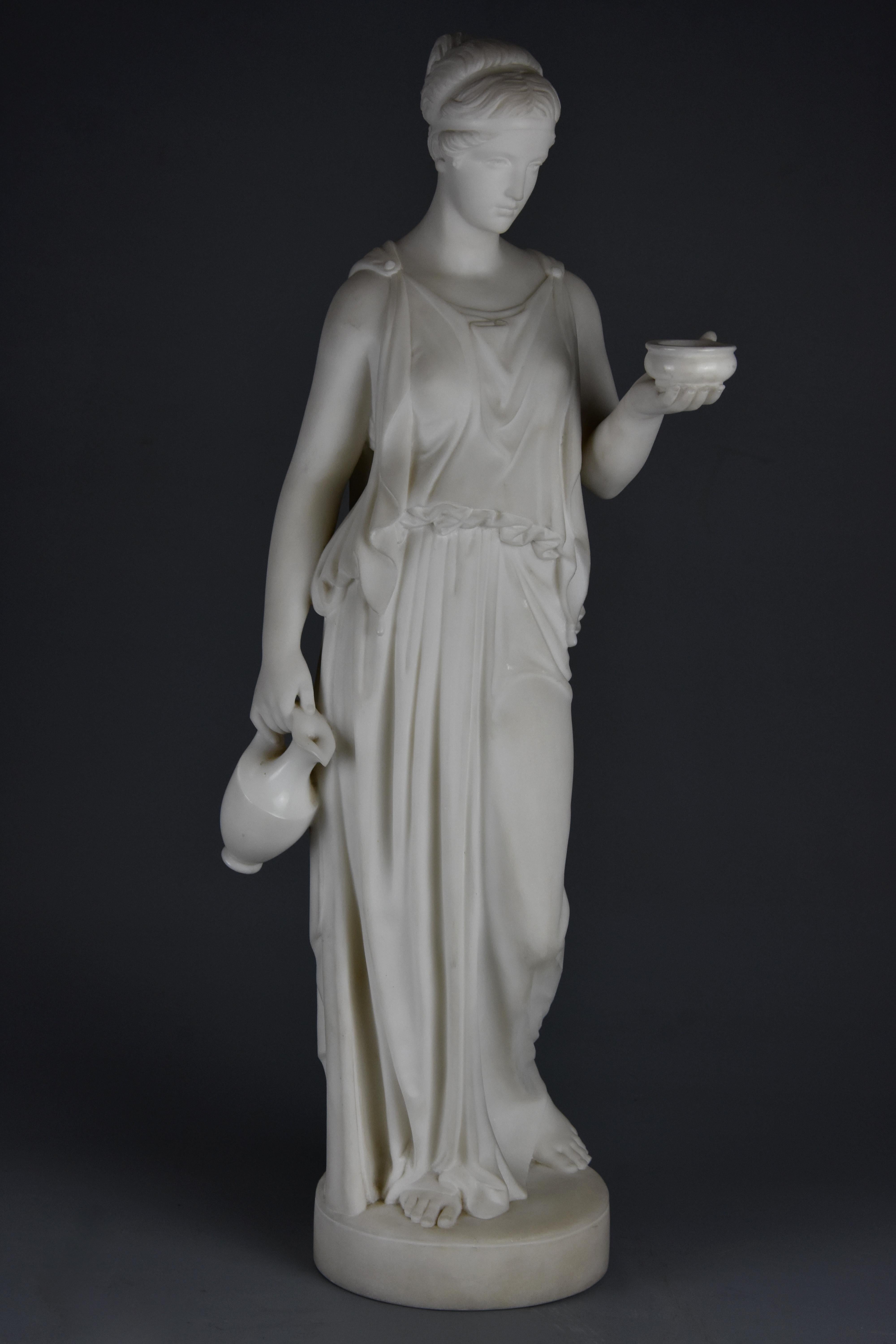 A fine quality mid-19th century carved marble figure of Hebe, goddess of youth after Bertel Thorvaldsen (1770-1844).

This sculpture depicts the fresh faced Hebe, who was said to have the gift of eternal youth, dressed in Classical draped chiton