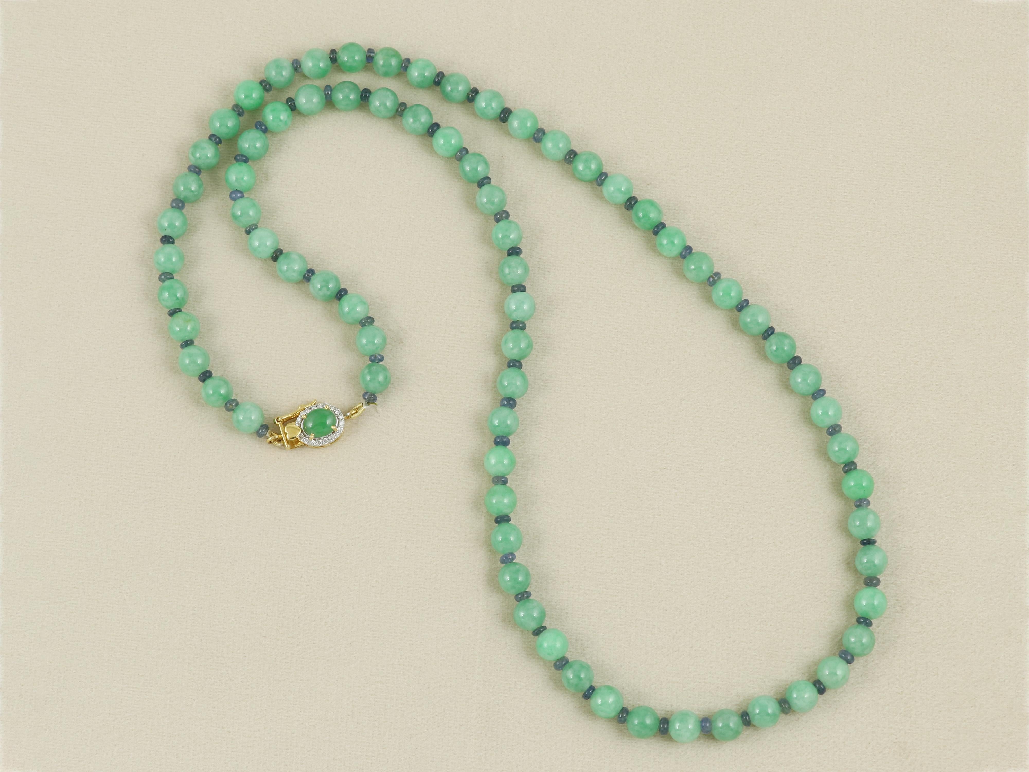 This exquisite necklace features natural green jadeite jade beads (approx. 7.50 mm each), prized for their rich color and translucency. Interspersed with natural blue sapphire beads, the necklace offers a striking contrast that enhances its elegant