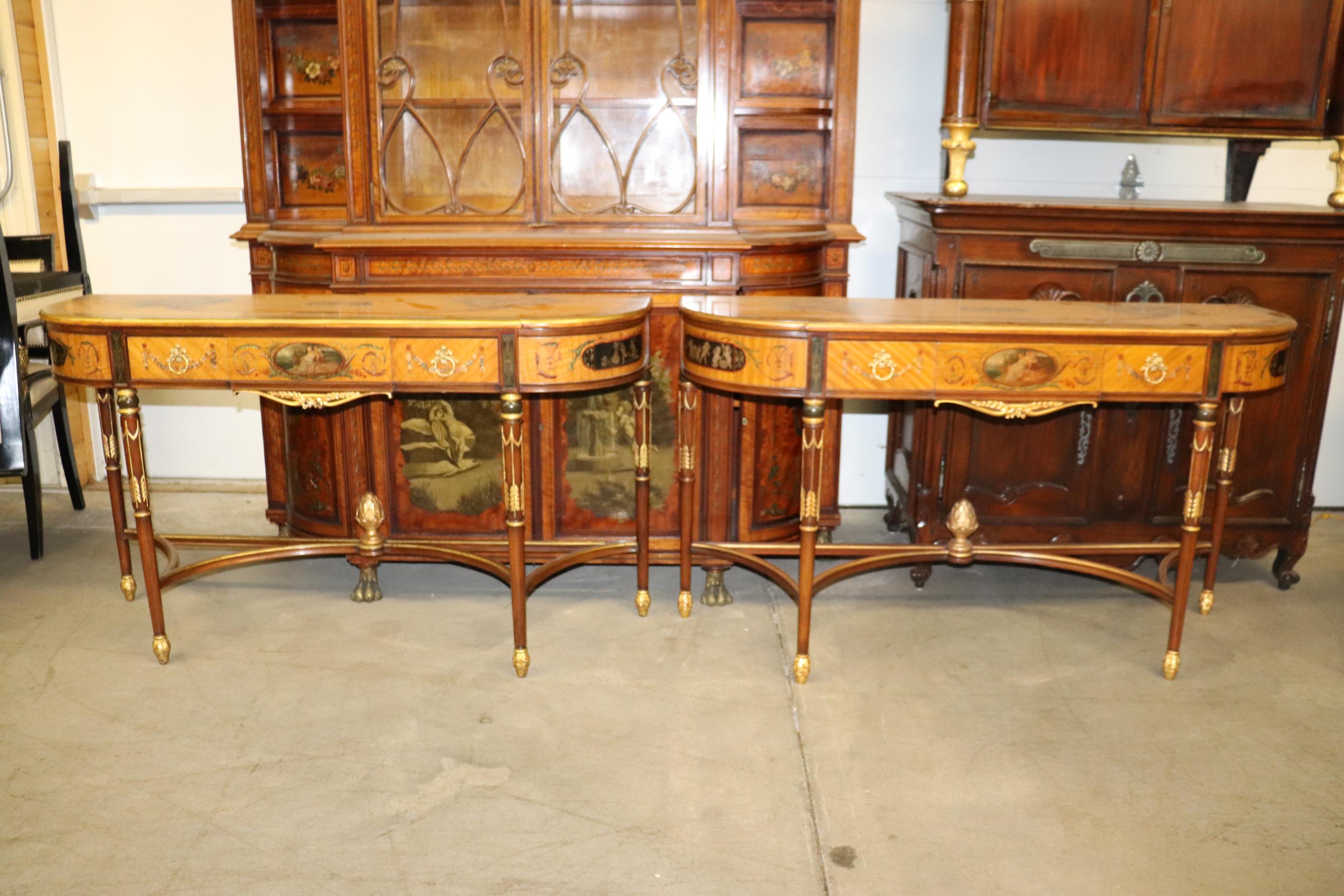 This is one of the finest sets of Engliahs Satinwood Adams consoles we've ever had. The tables are incredibly well painted and depict various floral and figural scenes and are in very good condition for their advanced age of almost 120 years. This