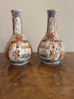 Fine quality pair of antique Japanese imari bottle shaped vases