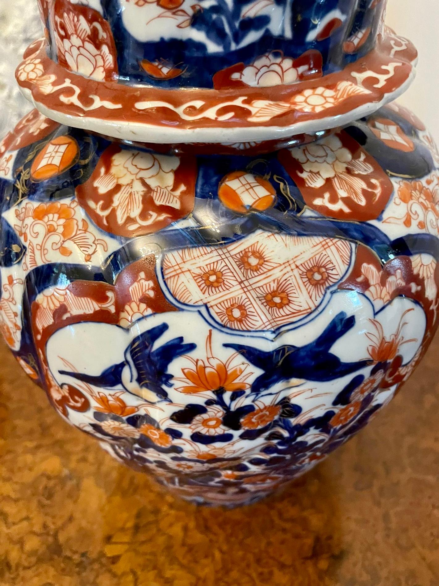 Porcelain Fine Quality Pair of Antique Japanese Imari Lidded Vases For Sale