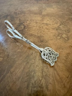 Fine quality pair of antique silver serving tongs