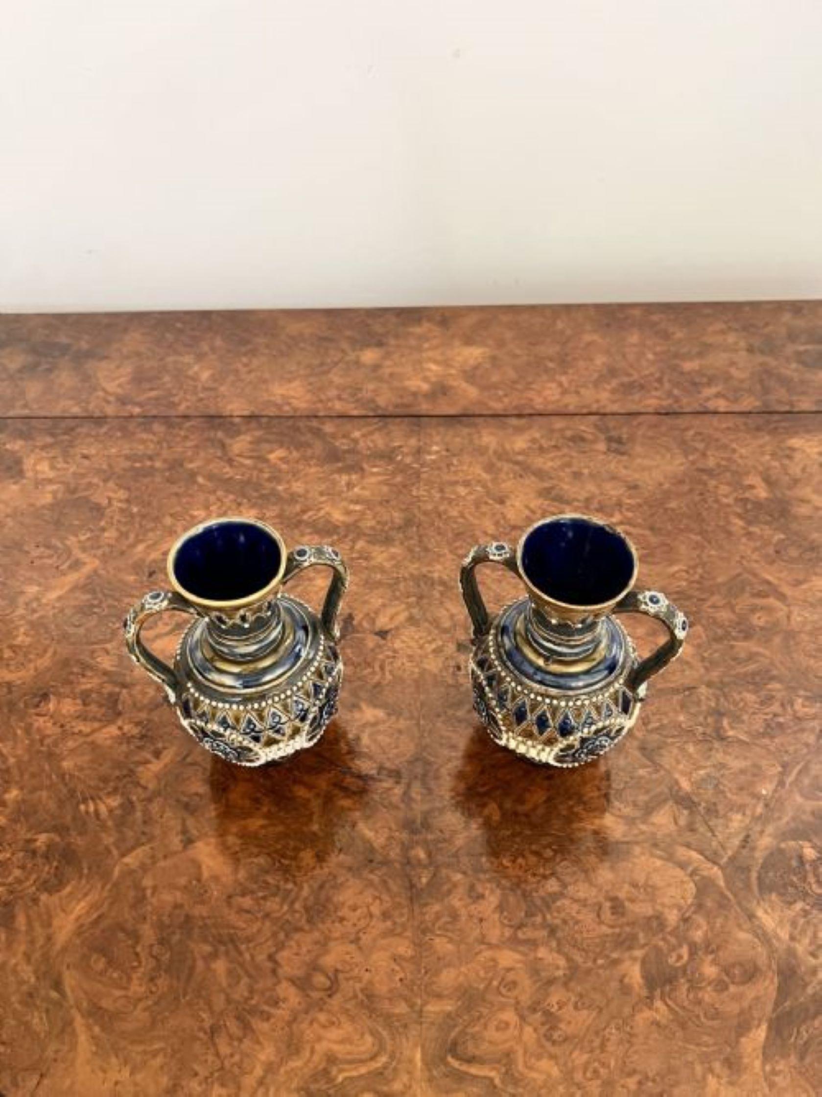 Fine quality pair of quality antique Victorian Doulton Lambeth small vases having a quality pair of antique Victorian Doulton Lambeth small vases with fantastic decoration throughout in lovely green, blue and brown and white colours, with two shaped